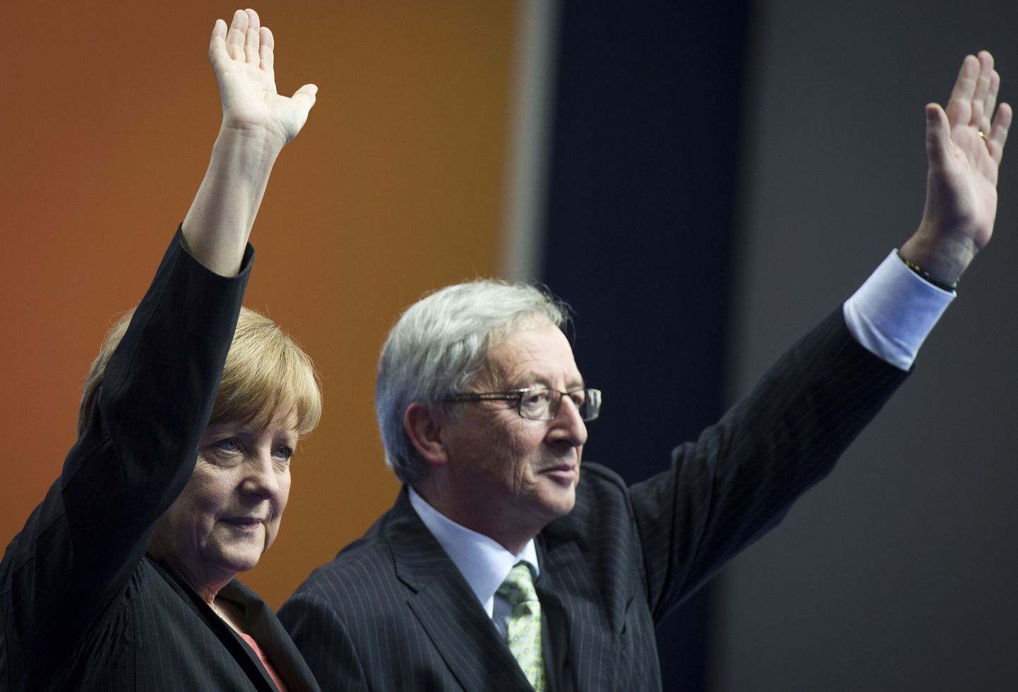 Бывший премьер-министр Люксембурга Жан-Клод Юнкер и канцлер Германии Ангела Меркель.
