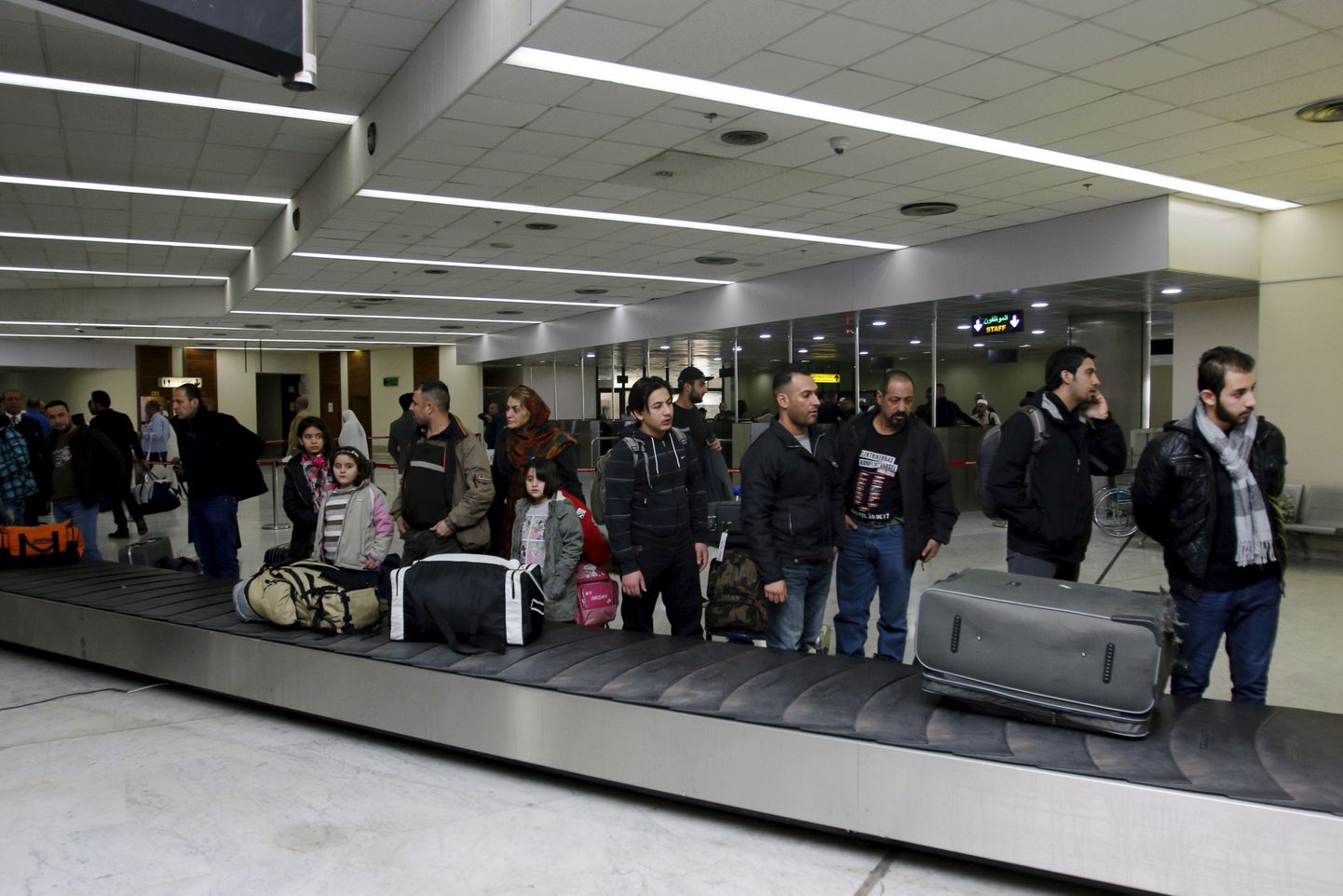 Soomest tagasipöördunud Iraagi pagulased Bagdadi lennujaamas.