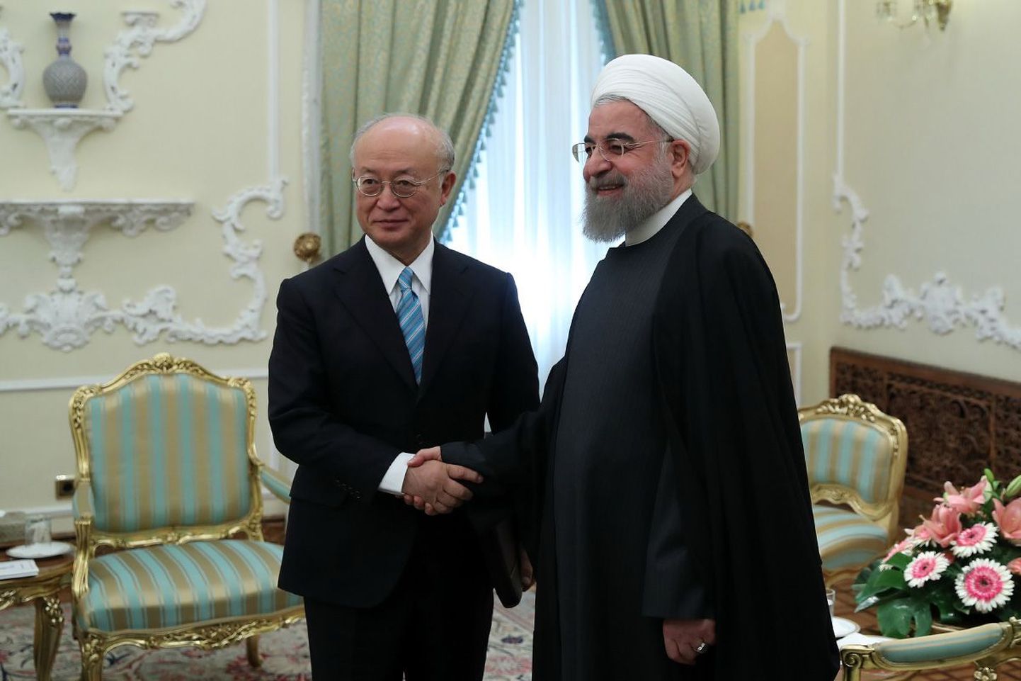 Hassan Rouhani ja Yukiya Amano.