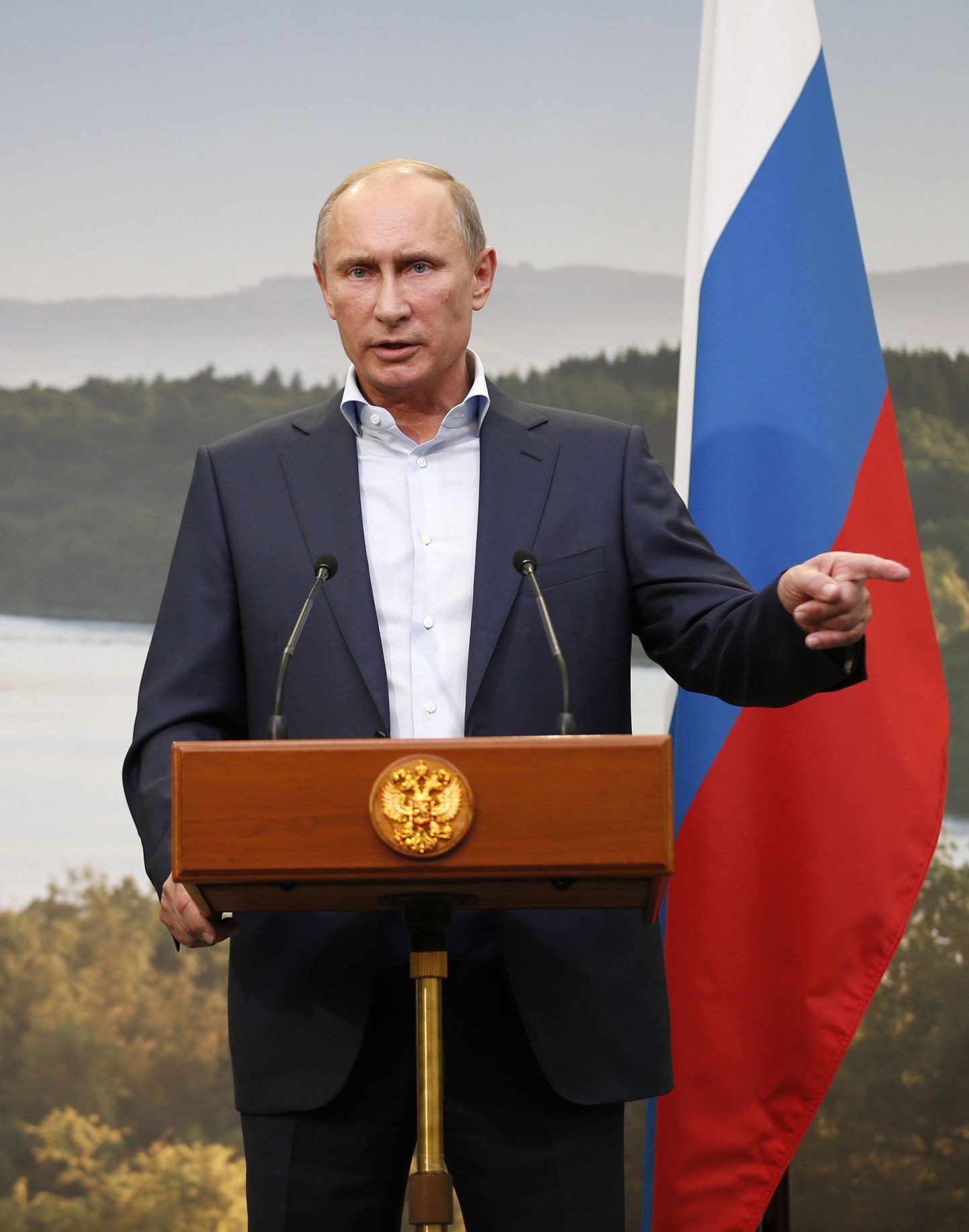 Президент РФ Владимир Путин на пресс-конференции по итогам саммита G8 в Северной Ирландии (18.06.2013).