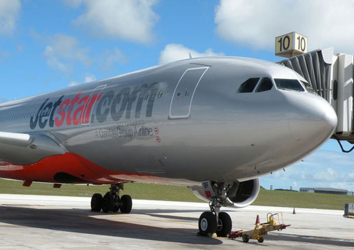 This photo provided by Guam radio and television broadcaster KUAM on June 11, 2009 shows a Jetstar Airbus A330-200 passenger jet sitting on the tarmac of Guam's international airport in Hagatna (formerly known as Agana) the day after in made an emergency landing during its flight from Japan to Australia.   Jetstar's flight JQ20 carrying 203 mostly Japanese passengers was about four hours into its journey from Osaka to the Gold Coast when the blaze broke out in the cockpit, prompting the captain to douse the flames with a fire extinguisher before diverting to Guam.   MANDATORY CREDIT: KUAM News    RESTRICTED TO EDITORIAL NEWS   GETTY OUT  NO COMMERICAL SALES     AFP PHOTO / KUAM News