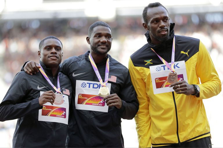 Meeste 100 meetri jooksu medalikolmik (vasakult): hõbedamees Christian Coleman, maailmameister Justin Gatlin ja pronksiomanik Usain Bolt.