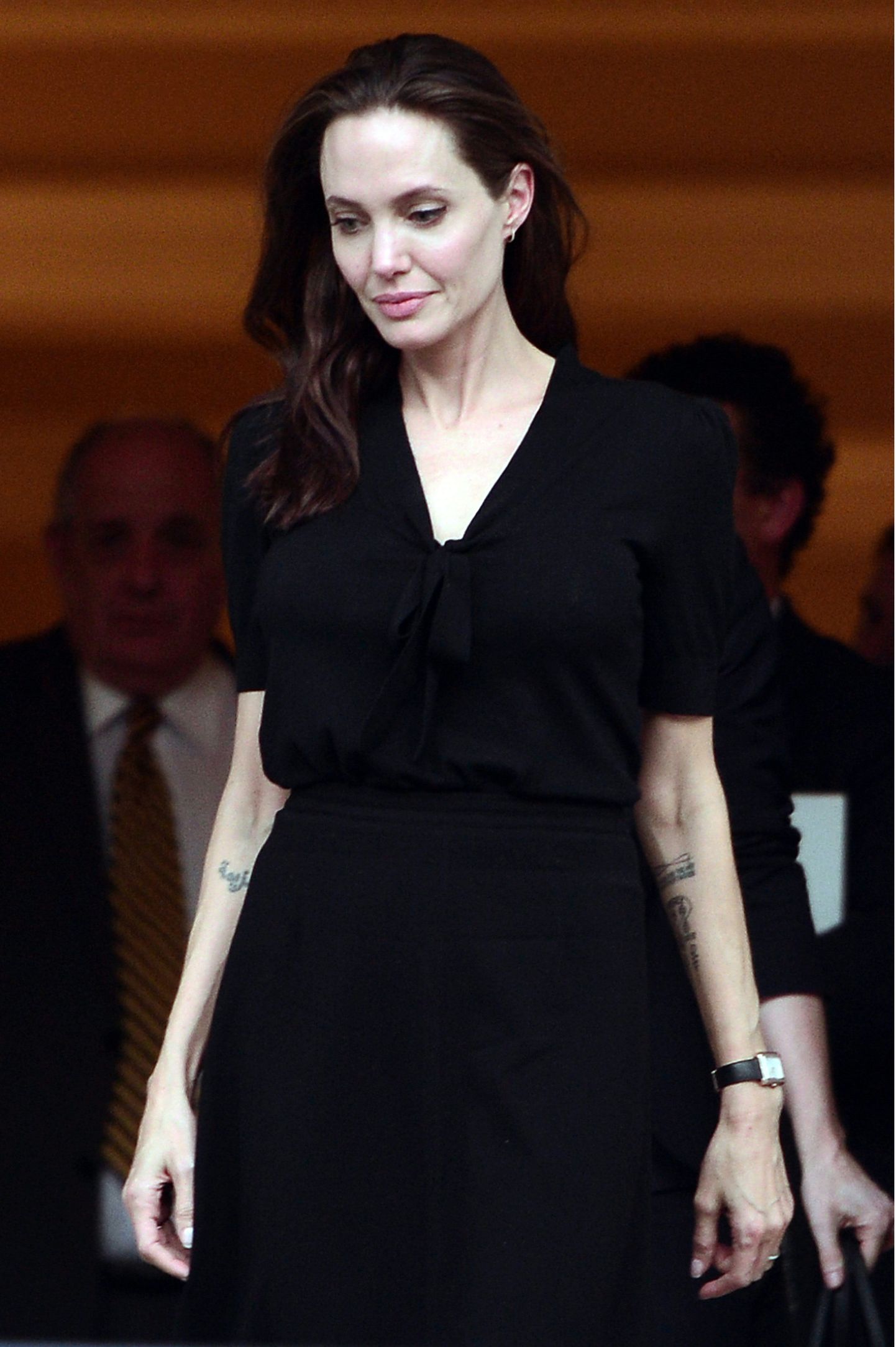 Hollywood star and UN refugee agency envoy Angelina Jolie leaves the Greek Prime minister's office in Athens following a meeting with Greek Prime minister on March 16, 2016.   / AFP PHOTO / LOUISA GOULIAMAKI