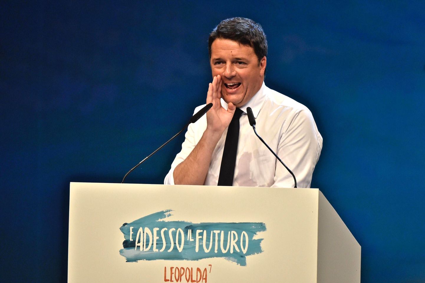 Italian Premier Matteo Renzi adresses a rally in Florence, Italy, Sunday, Nov. 6, 2016. Italian vill vote for a constitutional referendum next Dec. 4, a vote on which the government's current leader has staked his future. (Maurizio Degl'Innocenti/ANSA via AP)