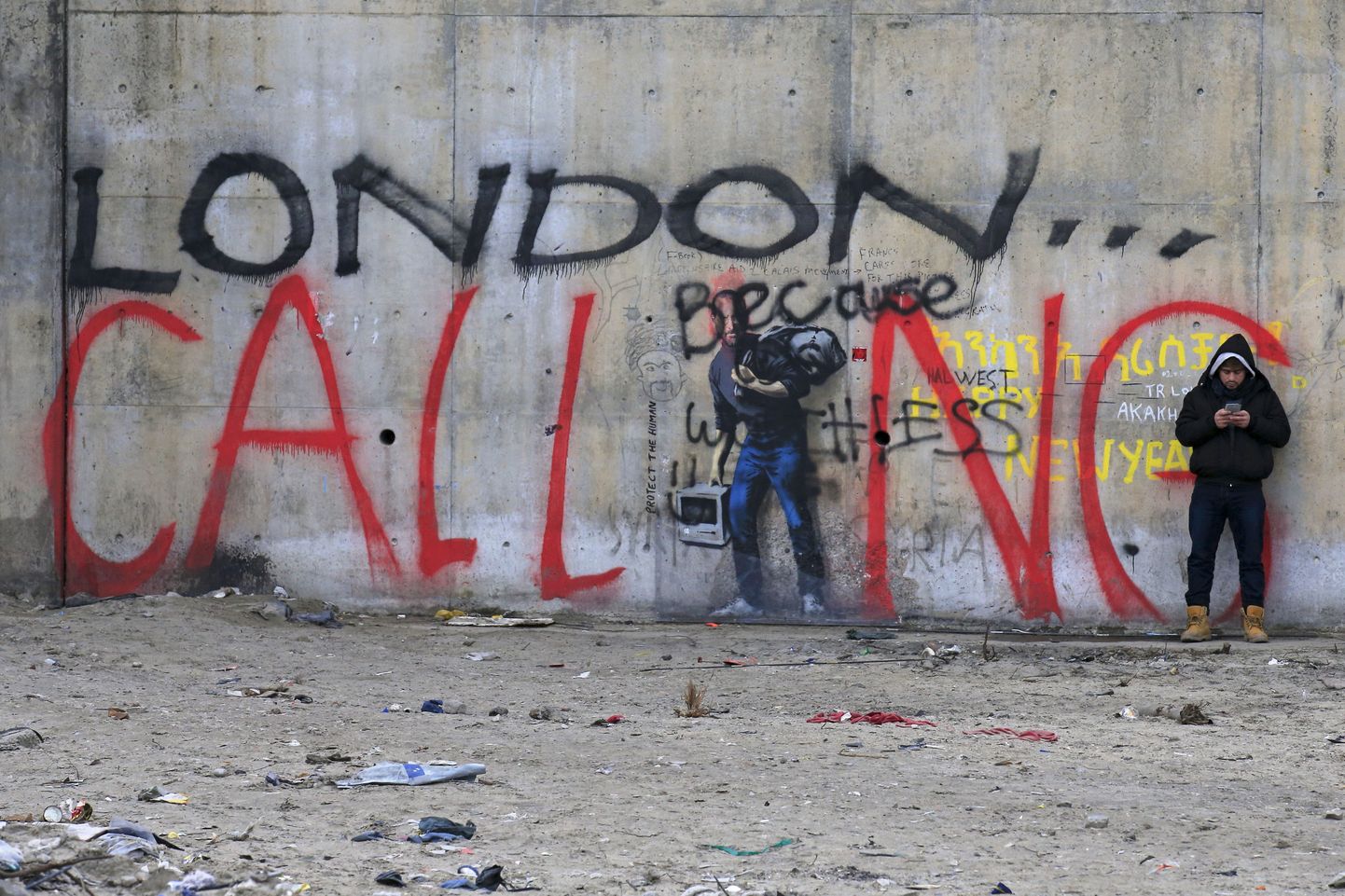 London kutsub, teatab grafiti Calais´s asuva migrantide laagri ehk nn džungli müüril.