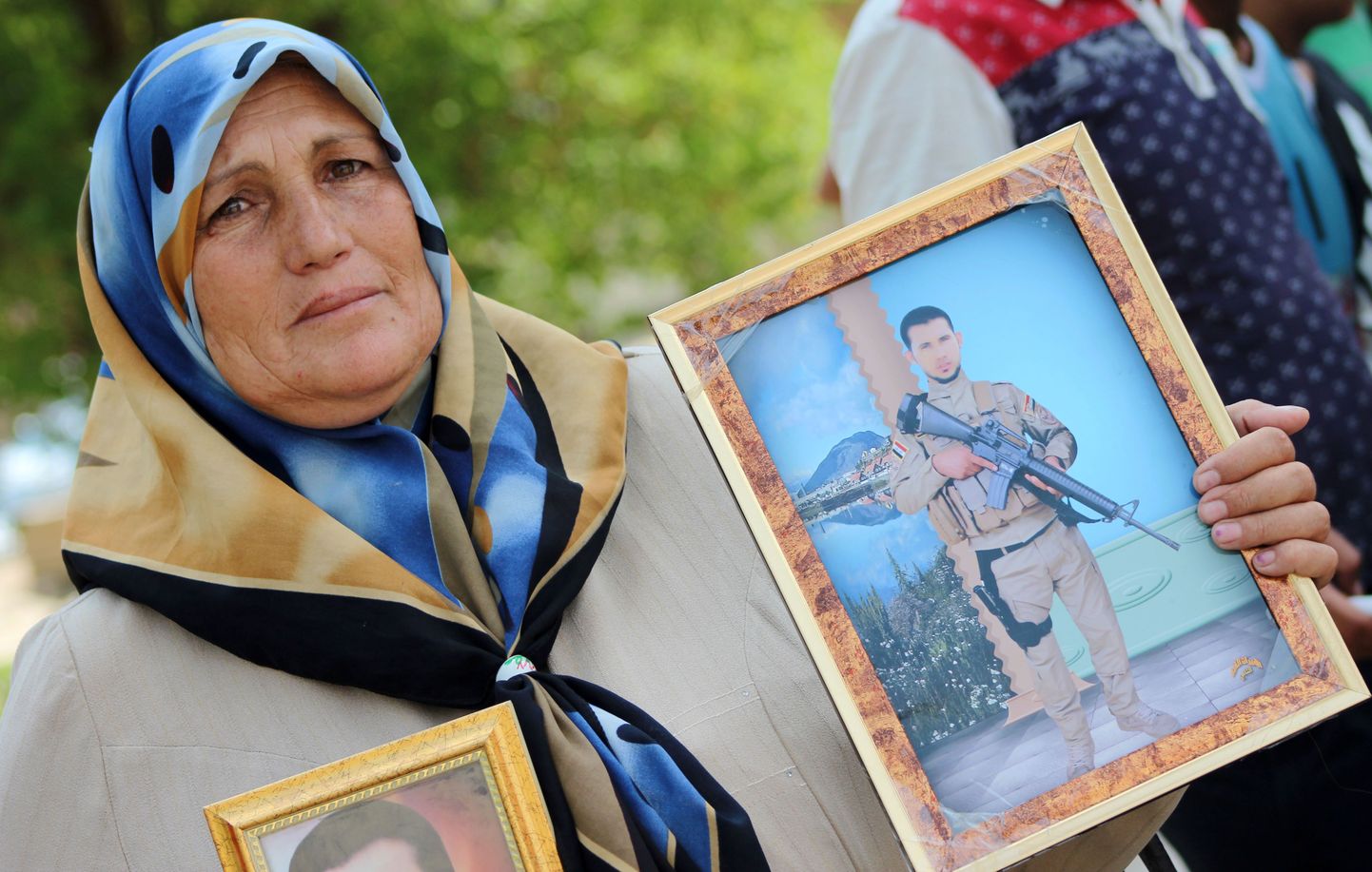 Iraagi ema hukatud poja pildiga.