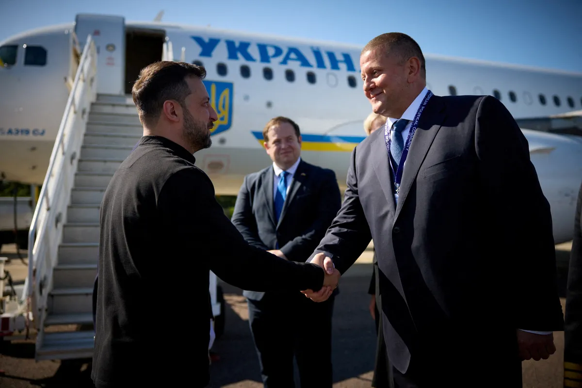 Ukrainian Ambassador to the United Kingdom Valerie Zaluzhnyi welcomes Ukraine's President Volodymyr Zelenskiy at an airport in an unknown location, as he arrives for the European Political Community meeting in Britain, July 18, 2024.