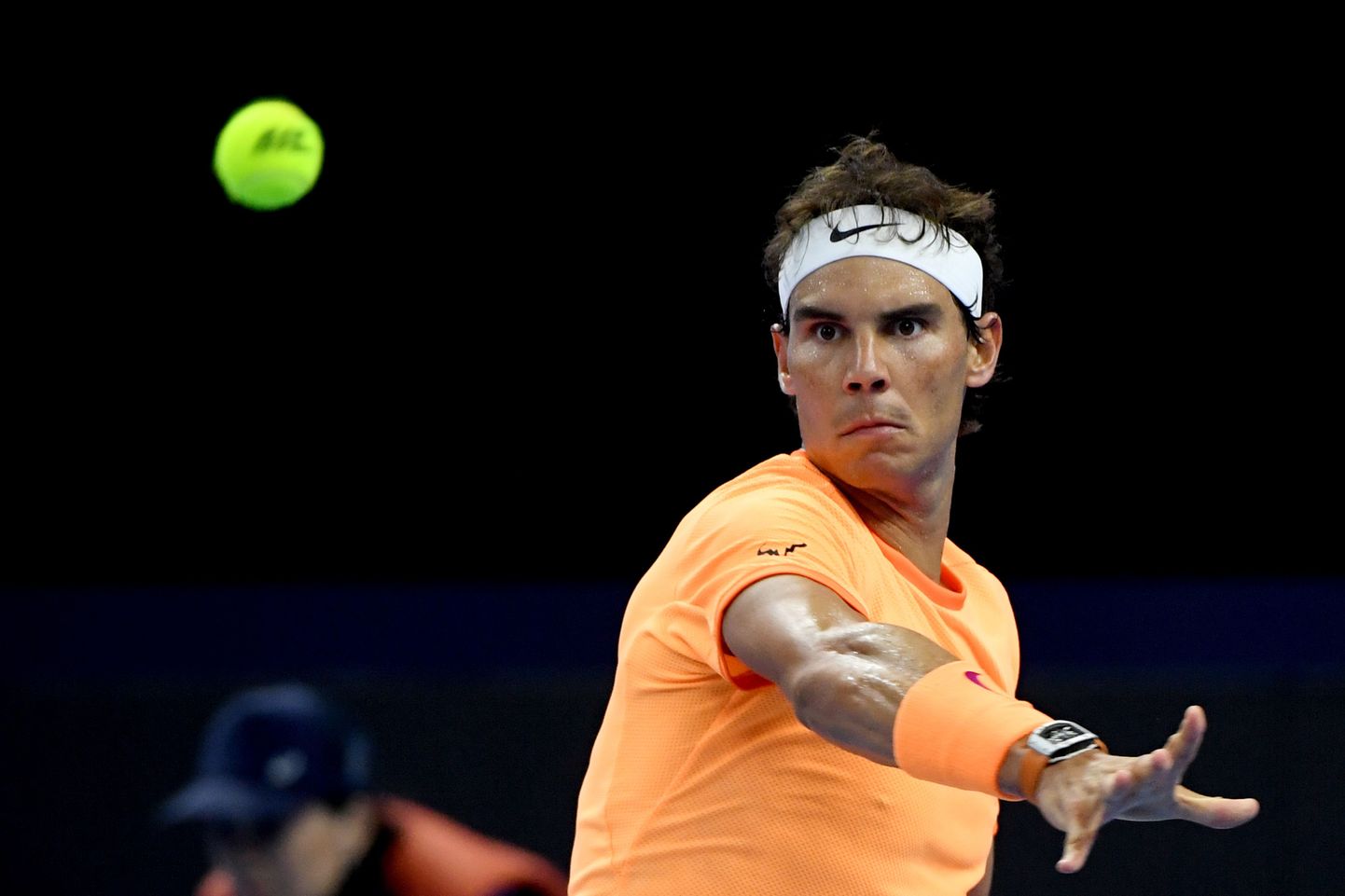 Rafael Nadal of Spain hits a return against Grigor Dimitrov of Bulgaria during the men's singles quater-finals match at the China Open tennis tournament in Beijing on October 7, 2016. / AFP PHOTO / WANG ZHAO