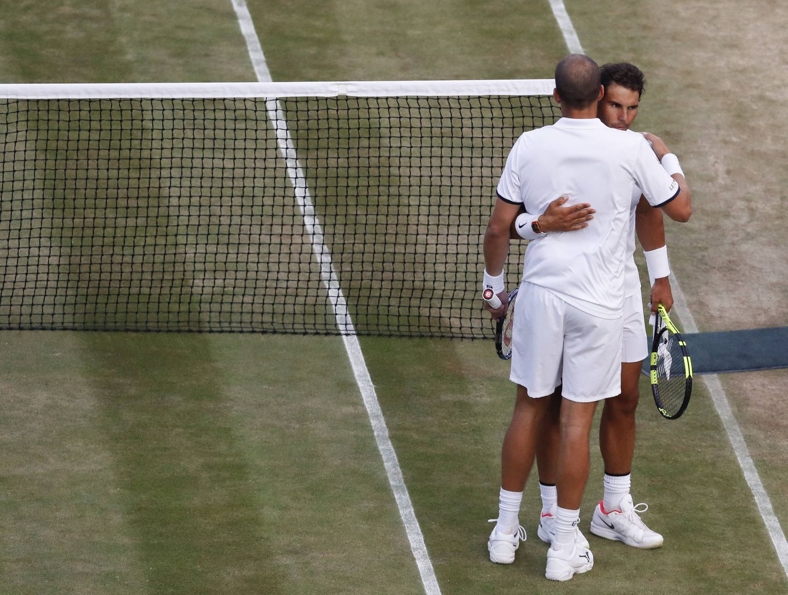 Bilder des Tages - SPORT  (170711) -- LONDON, July 11, 2017 -- Rafael Nadal (R) of Spain greets Gilles Muller of Luxembourg after their men s singles fourth round match at the Championship Wimbledon 2017 in London, Britain on July 10, 2017. Nadal lost 2-3. )(wll) (SP)BRITAIN-LONDON-TENNIS-WIMBLEDON-DAY 7 HanxYan PUBLICATIONxNOTxINxCHN

Images the Day Sports 170711 London July 11 2017 Rafael Nadal r of Spain greets Gilles Muller of Luxembourg After their Men s Singles Fourth Round Match AT The Championship Wimbledon 2017 in London Britain ON July 10 2017 Nadal Lost 2 3 wll SP Britain London Tennis Wimbledon Day 7 HanxYan PUBLICATIONxNOTxINxCHN