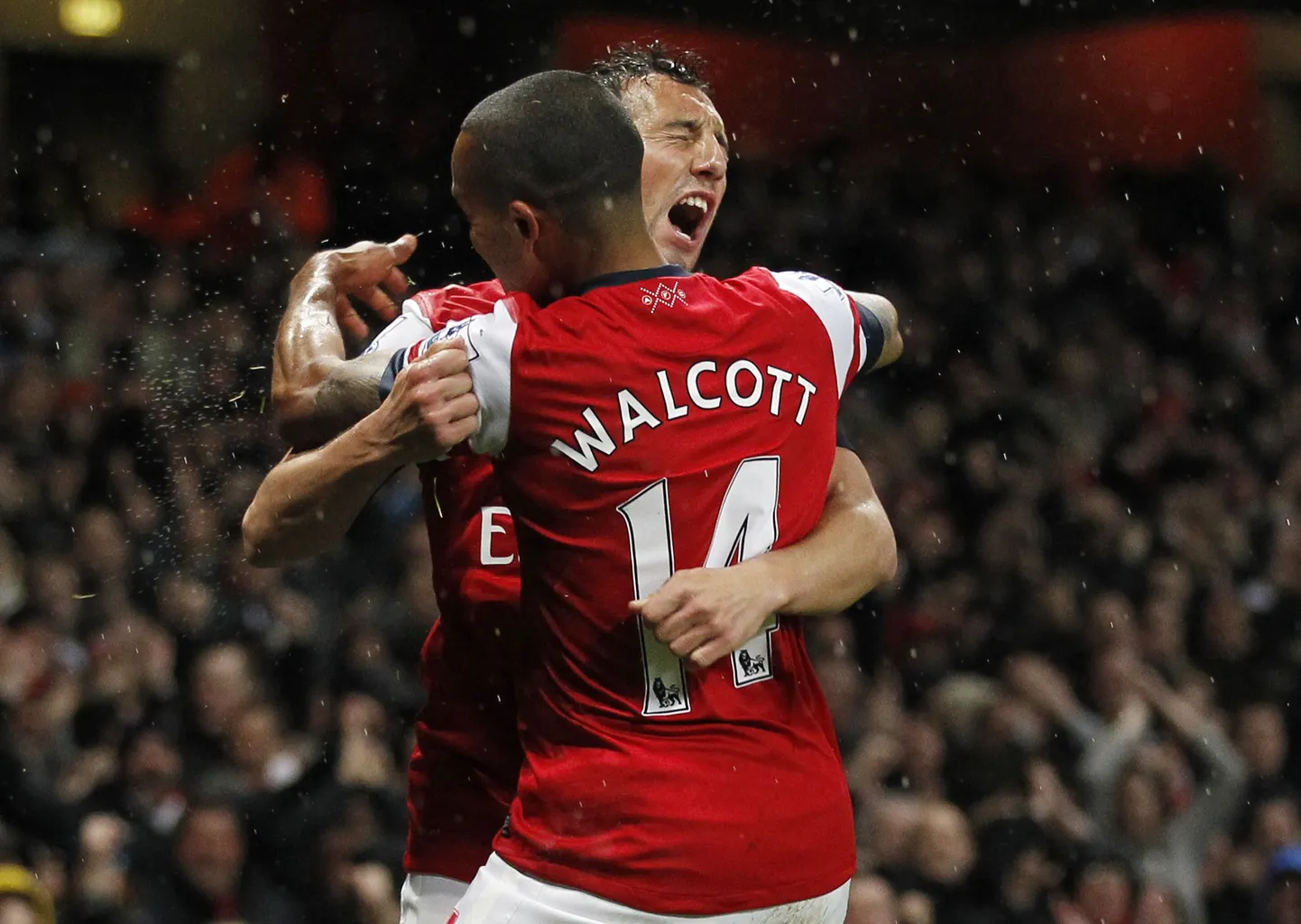 Theo Walcott ja Santi Cazorla