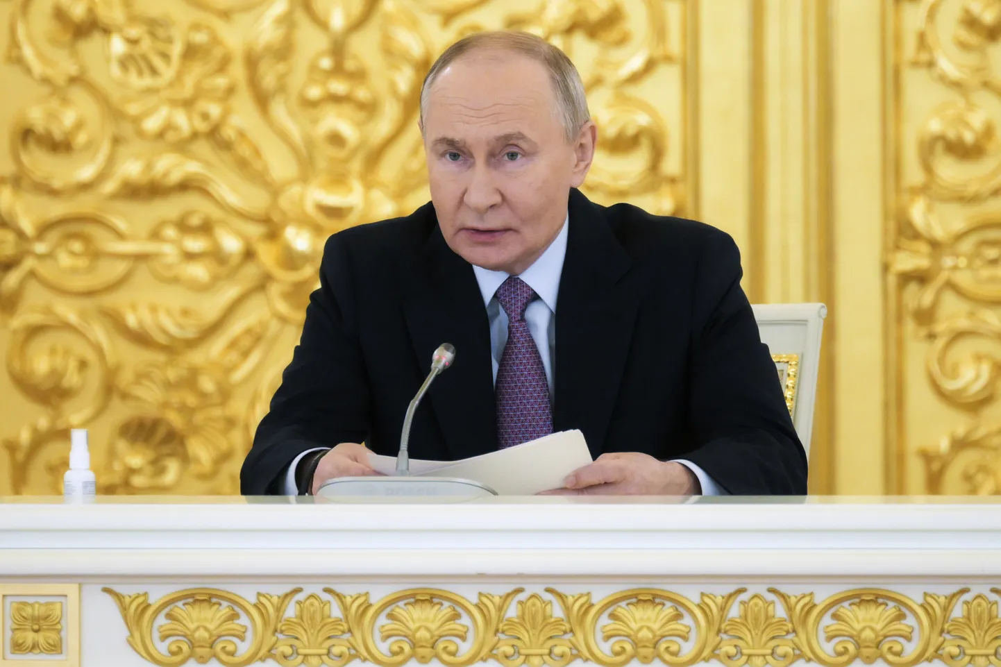 Путин