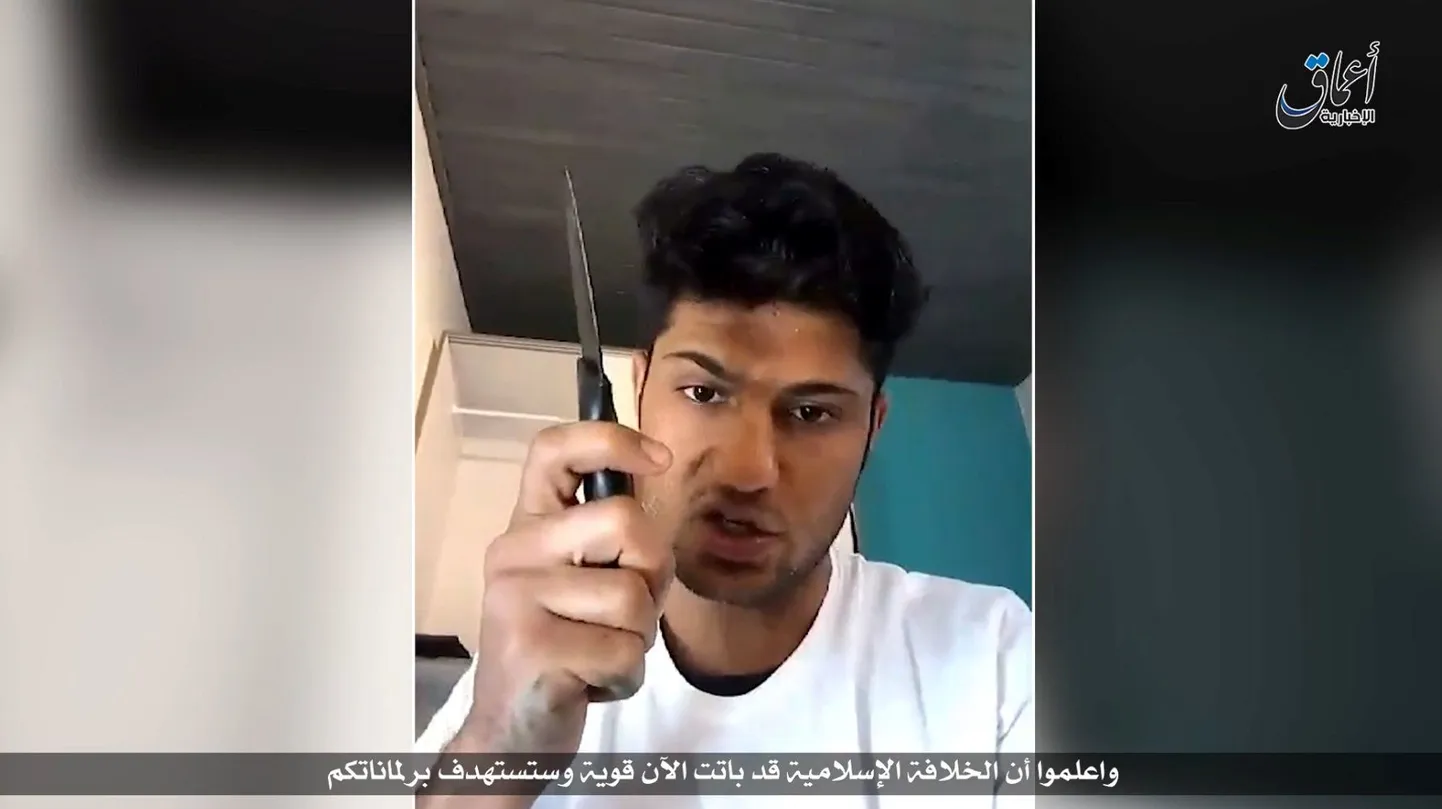 Kaader ISISe avaldatud videost, kus afgaani päritolu Riaz Khan Ahmadzai ähvardas Saksamaad uute rünnakutega.