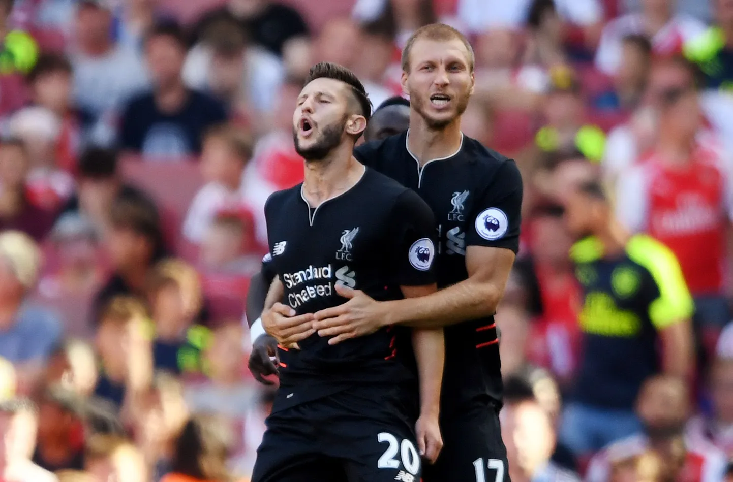 Adam Lallana (ees) ja Ragnar Klavan väravat tähistamas.