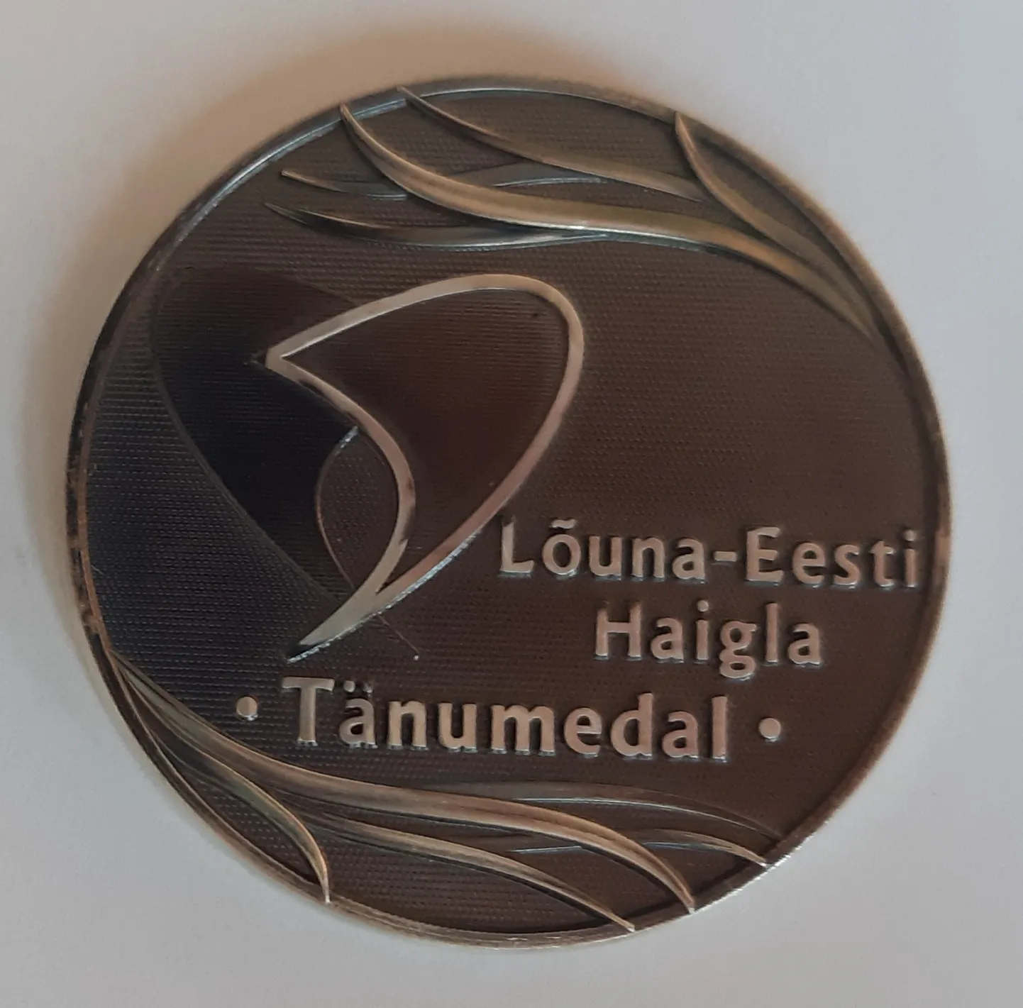 Tänumedal.