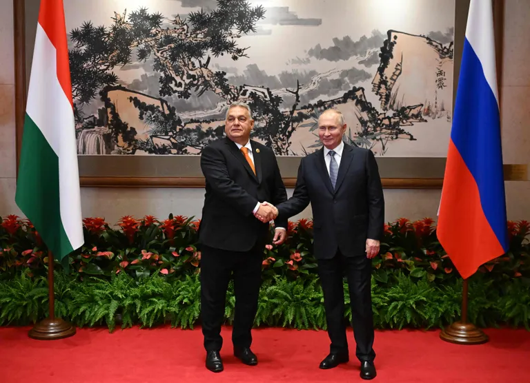 Hungarian Prime Minister Viktor Orbán and Russian President Vladimir Putin shake hands. October 17, 2023. Orbán is a frequent guest in Moscow.