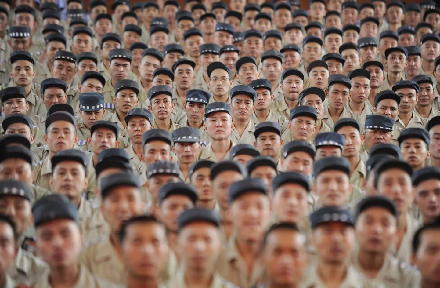 Taiyani vangla kinnipeetud eelmise aasta septembris kõnet kuulamas. Pildil on illustreeriv tähendus. 

Inmates listen to a speech at Taiyuan No.1 prison in Taiyuan, Shanxi province September 1, 2010. Some 1,000 inmates attended the speech which was considered one of the educational and reformation measures organised by the prison, local media reported. Picture taken September 1, 2010. REUTERS/Stringer (CHINA - Tags: CRIME LAW IMAGES OF THE DAY) CHINA OUT. NO COMMERCIAL OR EDITORIAL SALES IN CHINA