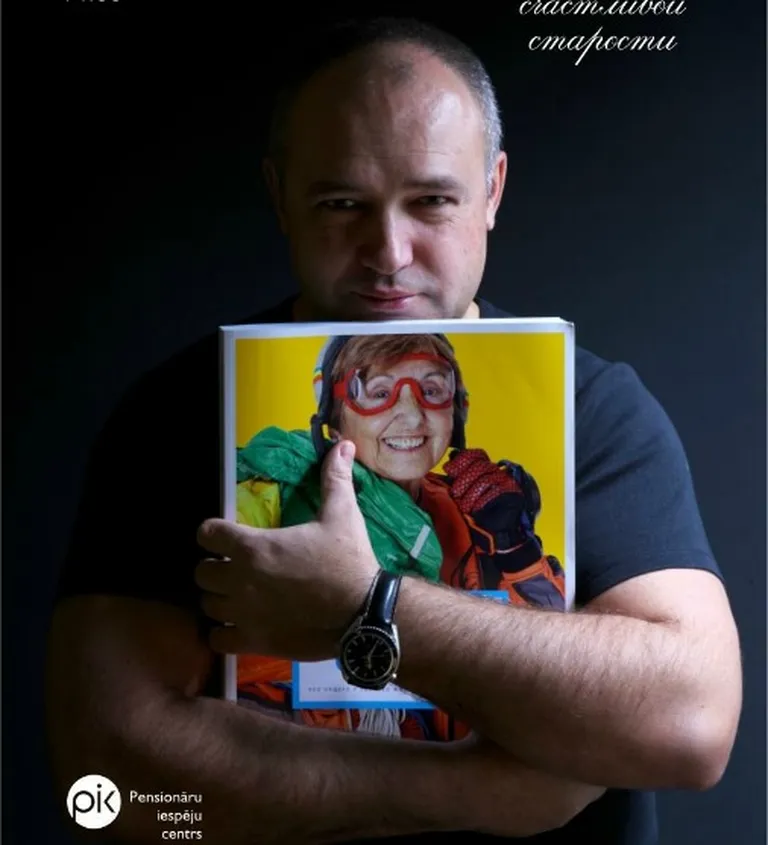 Александр Гришуленок на плакате с презентации в Риге вдохновляющей книги Владимира Яковлева "Возраст счастья"