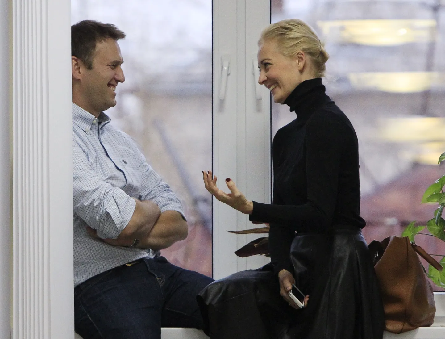 Opositsioonijuht Aleksei Navalnõi koos abikaasa Juliaga Kirovi oblasti kohtumajas.
