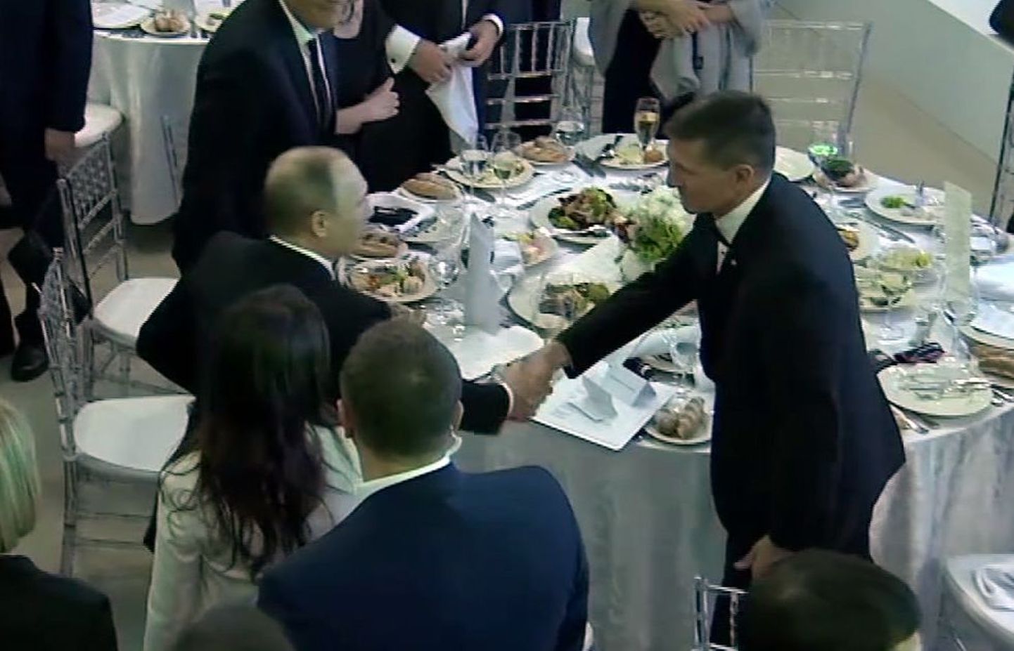 Владимир Путин и Майкл Флинн в 2015 году.