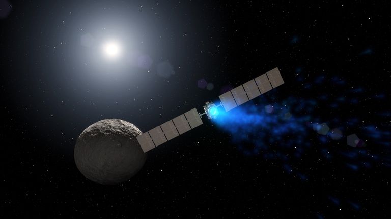 NASA joonistus Dawn kosmosesondist ja kääbusplaneedist Ceres