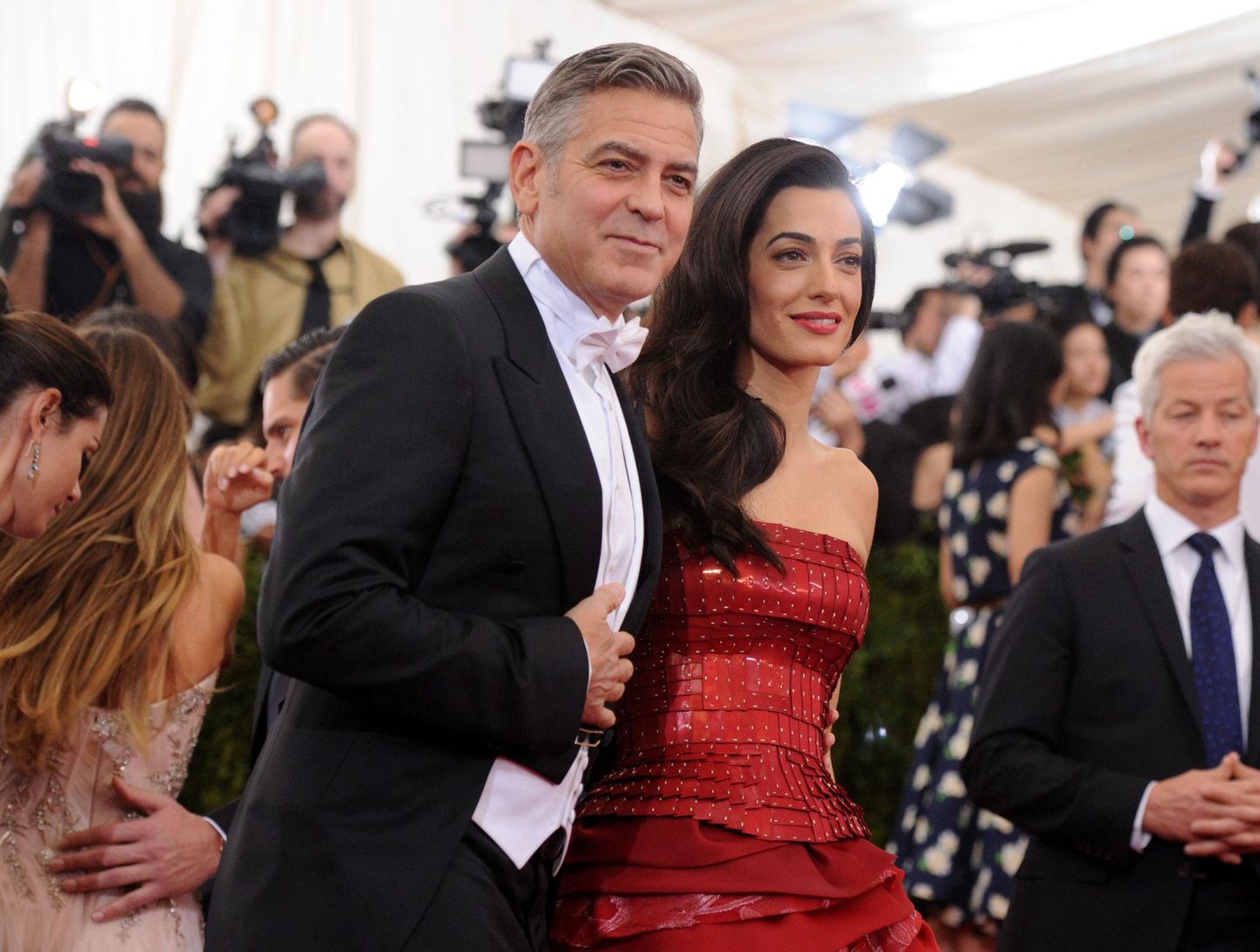 George Clooney and Amal Clooney arrive at The Metropolitan Museum of Art's Costume Institute benefit gala celebrating "China: Through the Looking Glass" on Monday, May 4, 2015, in New York. (Photo by Evan Agostini/Invision/AP)