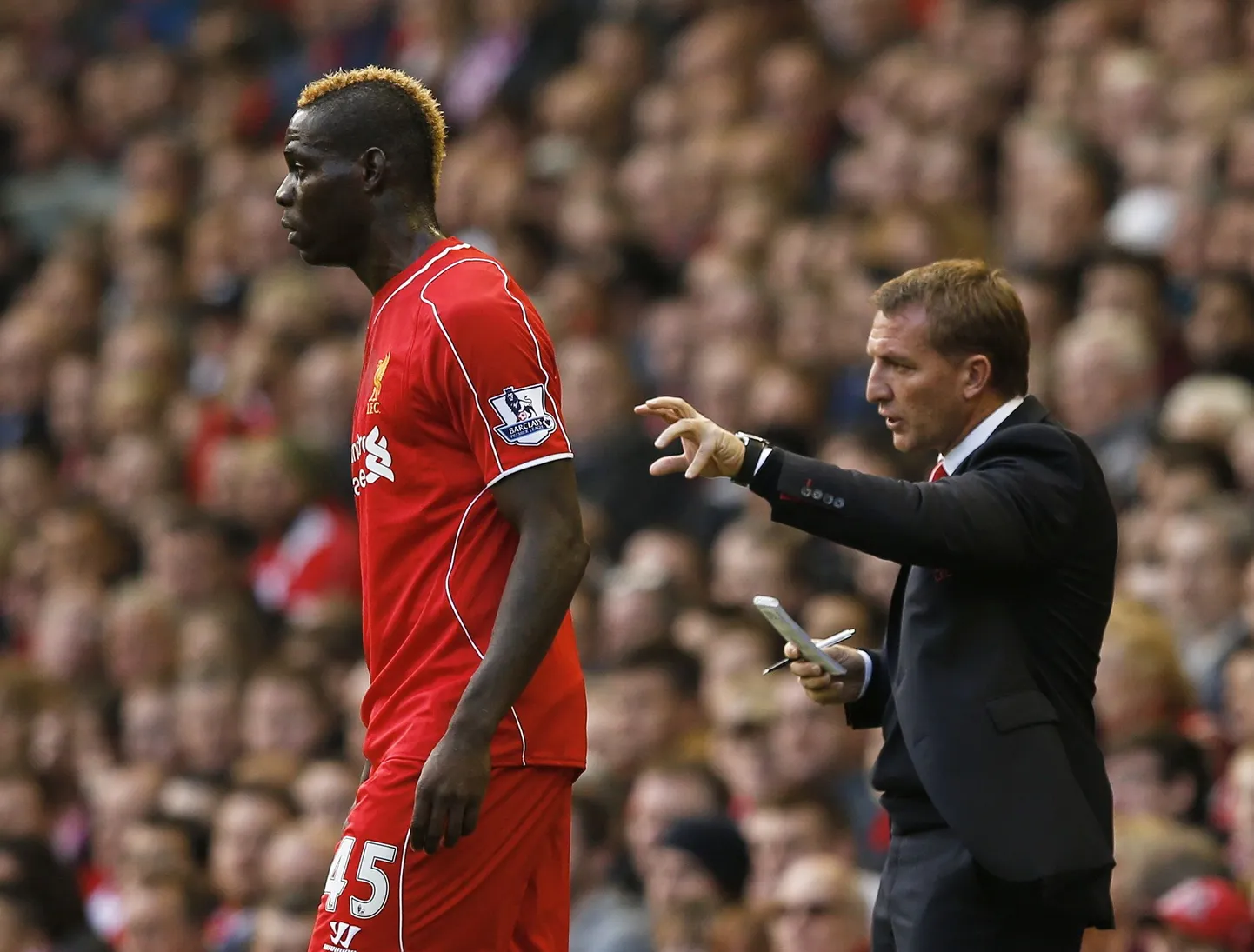 Mario Balotelli (vasakul) ja Liverpooli peatreener Brendan Rodgers.