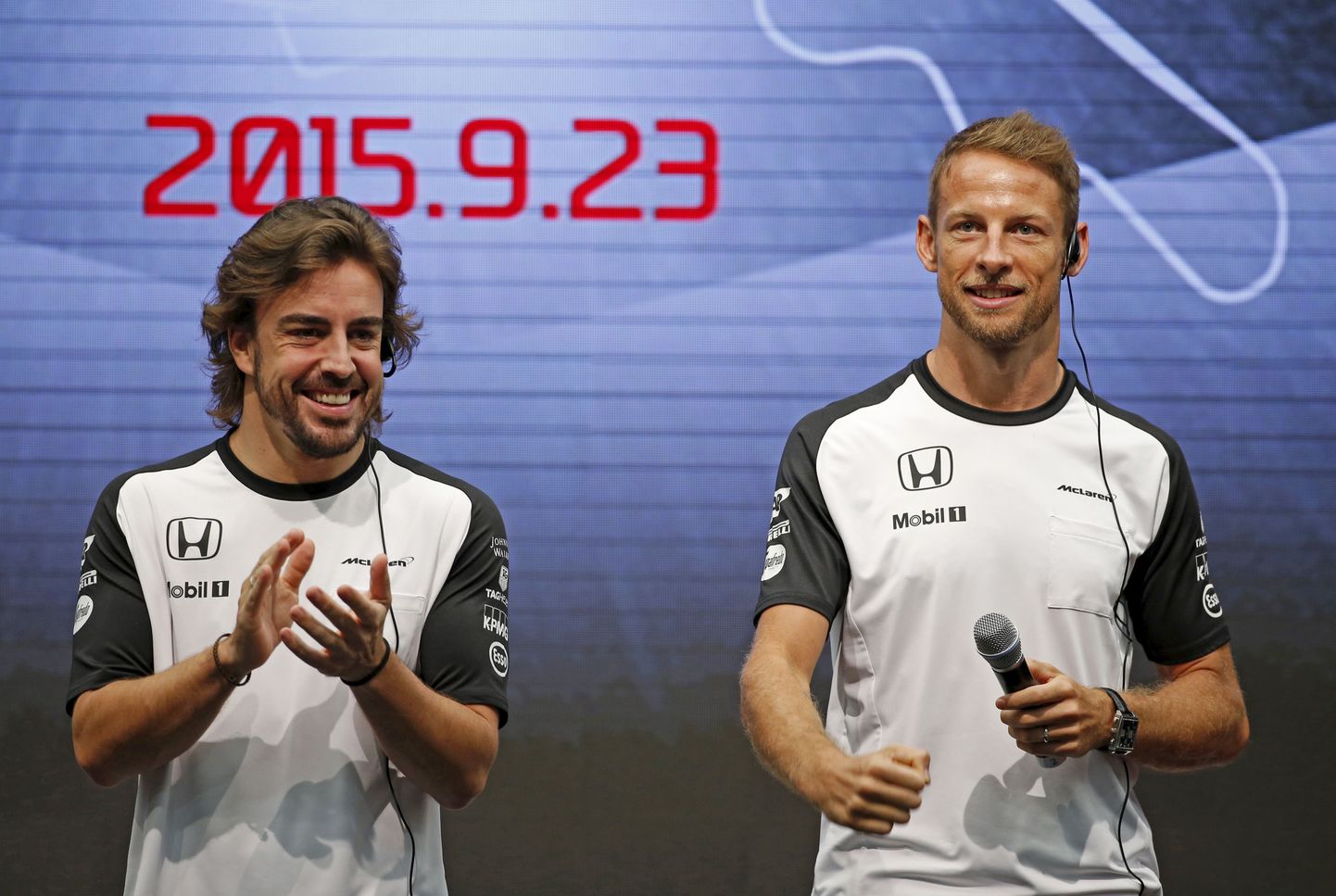 Fernando Alonso (Vasakul) ja Jenson Button.