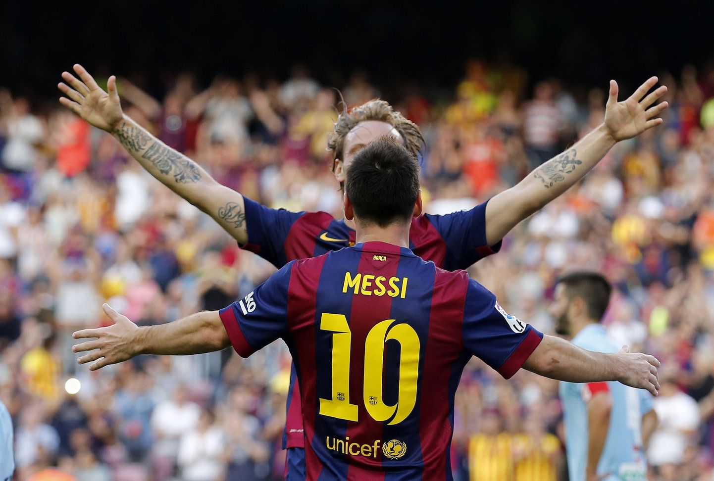 Ivan Rakitic ja Lionel Messi