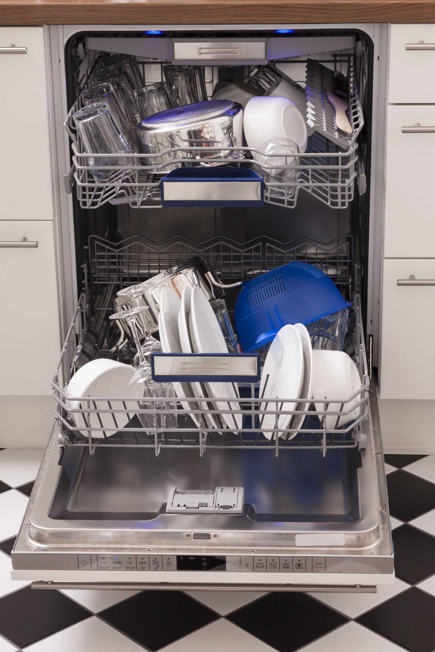 dishwasher with clean dishes and blue light
