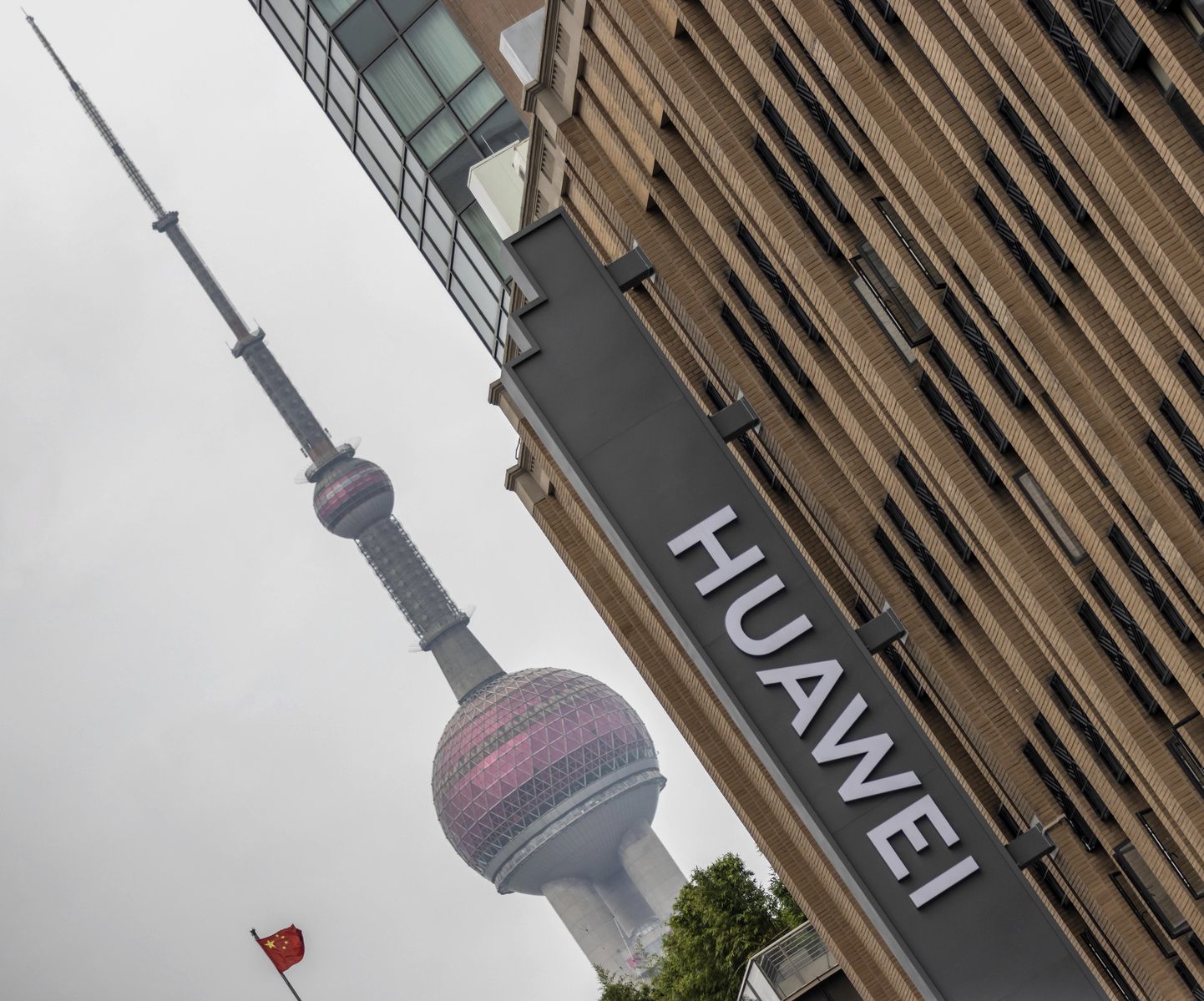 epa08549222 Huawei's newest flagship store building is seen in Shanghai, China, 16 July 2020. British digital secretary announced on 14 July 2020 that country's telecom network will not be allowed to purchase new Huawei 5G kit from 31 December and that all Huawei's equipment should be sorted out of UK's mobile networks by 2027. Chinese government 'strongly opposed groundless ban of Huawei's 5G kit'.  EPA/ALEX PLAVEVSKI
