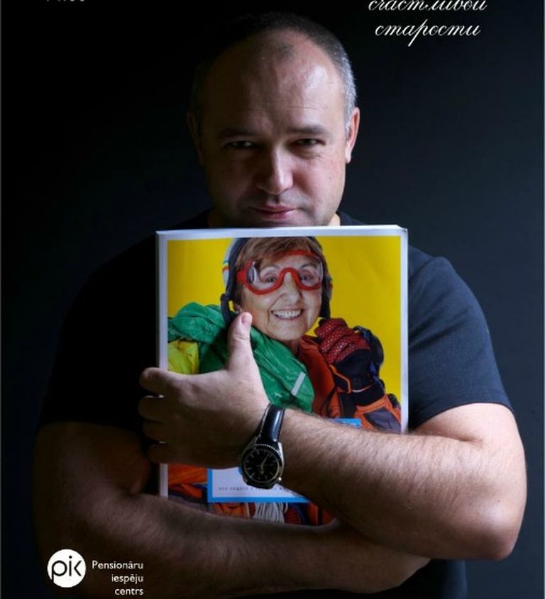 Александр Гришуленок на плакате с презентации в Риге вдохновляющей книги Владимира Яковлева "Возраст счастья" 