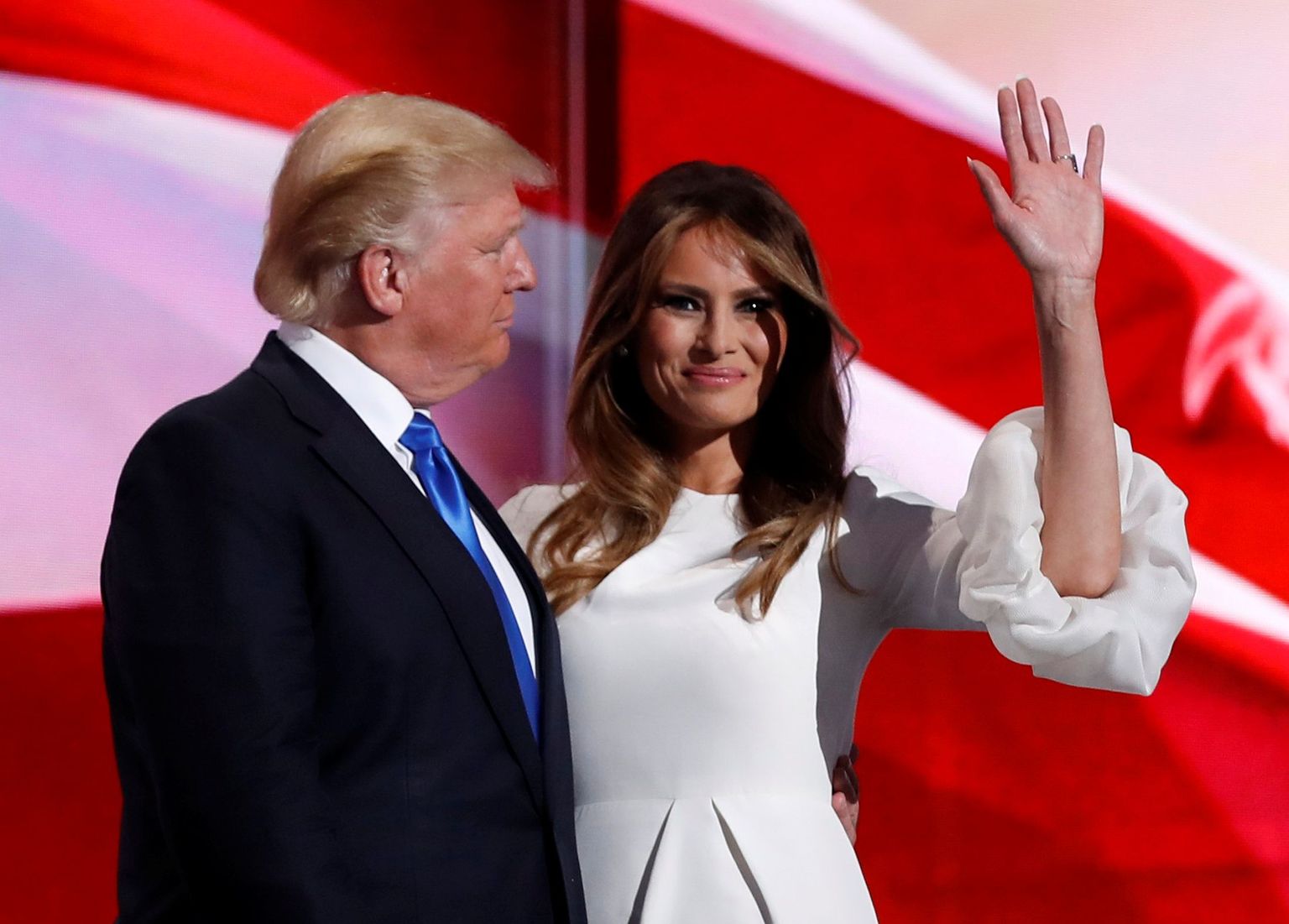 Melania Trump stands with her husband Republican U.S. presidential candidate Donald Trump at the Republican National Convention in Cleveland, Ohio, U.S. July 18, 2016. REUTERS/Mark Kauzlarich/File Photo