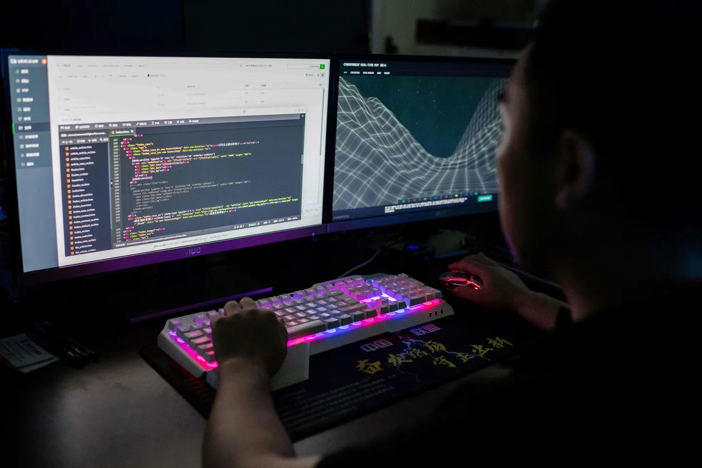 CORRECTION - This photo taken on August 4, 2020 shows Prince, a member of the hacking group Red Hacker Alliance who refused to give his real name, using a website that monitors global cyberattacks on his computer at their office in Dongguan, China's southern Guangdong province. - From a small, dingy office tucked away in an industrial city in southern China, one of China's last "volunteer hacker" groups maintains a final outpost in its patriotic hacking war. (Photo by NICOLAS ASFOURI / AFP) / TO GO WITH China-hacking-security,FOCUS by Laurie Chen / The erroneous mention[s] appearing in the metadata of this photo by NICOLAS ASFOURI has been modified in AFP systems in the following, we removed the HOLD HOLD HOLD in the main caption.   Please immediately remove the erroneous mention[s] from all your online services and delete it (them) from your servers. If you have been authorized by AFP to distribute it (them) to third parties, please ensure that the same actions are carried out by them. Failure to promptly comply with these instructions will entail liability on your part for any continued or post notification usage. Therefore we thank you very much for all your attention and prompt action. We are sorry for the inconvenience this notification may cause and remain at your disposal for any further information you may require.
