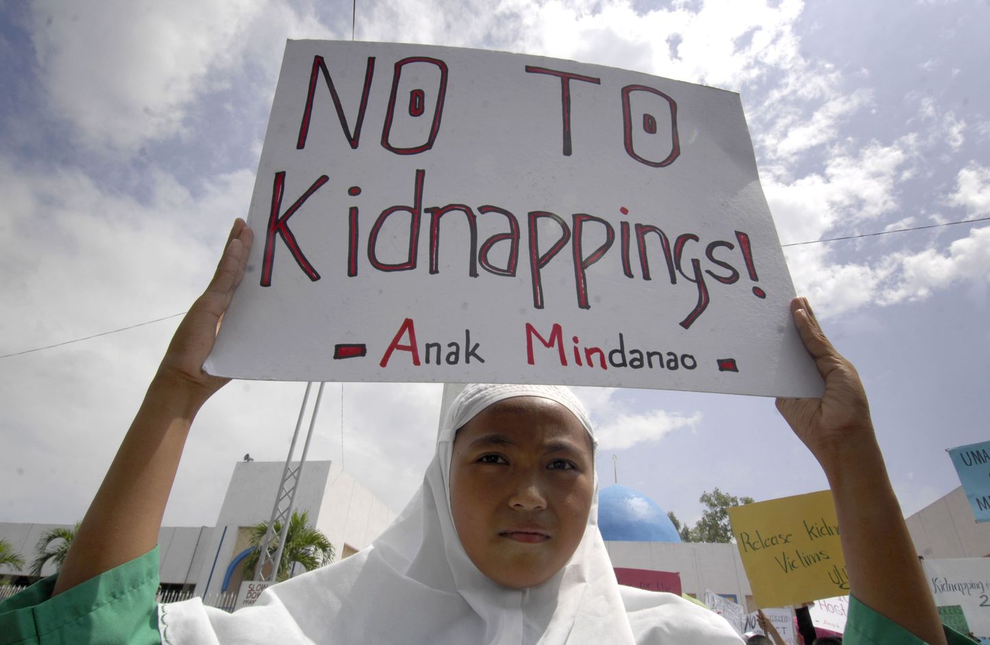 Moslemiusku filipiini tüdruk inimröövide vastasel meeleavaldusel.