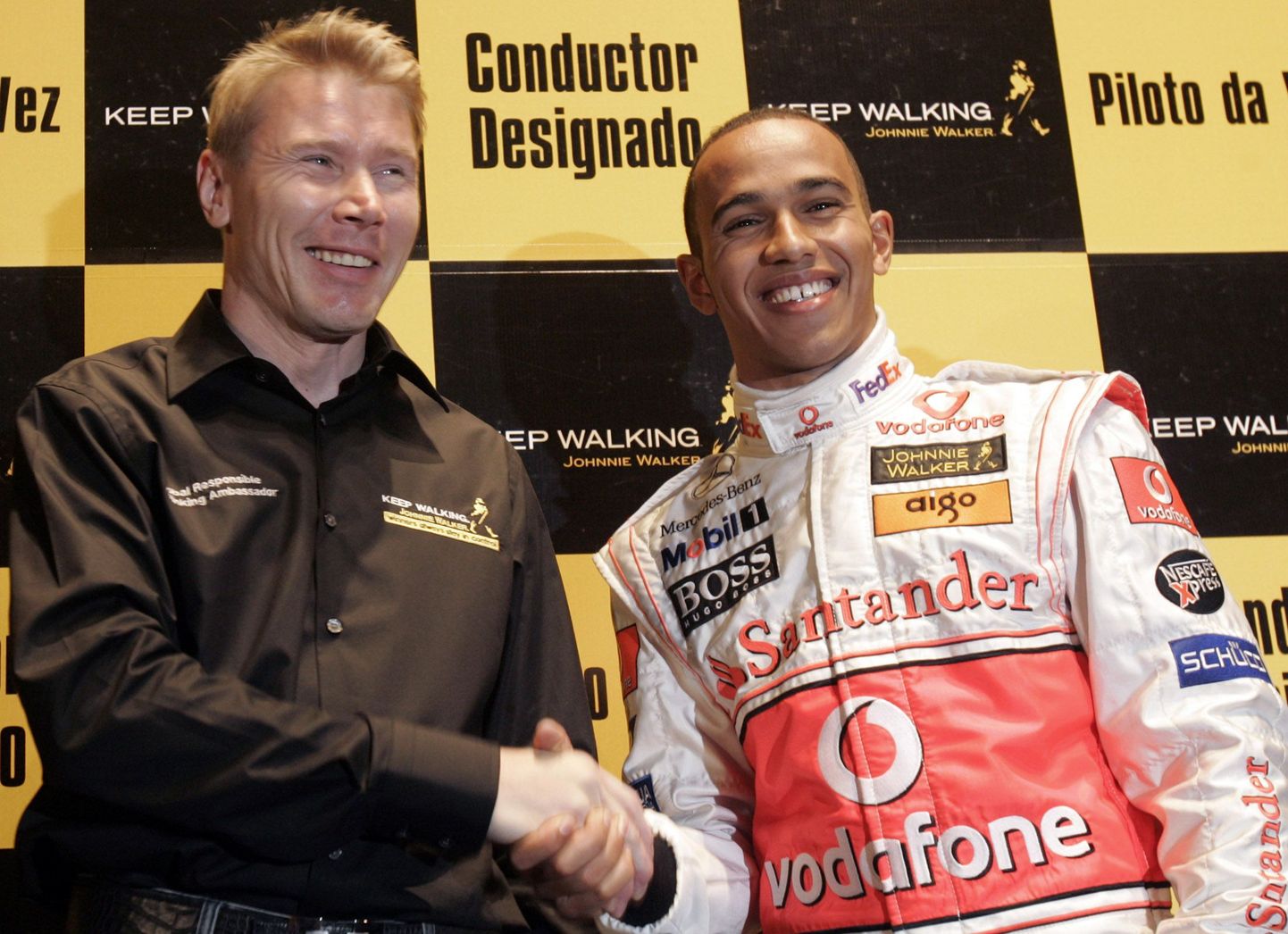 Mika Häkkinen ja Lewis Hamilton.