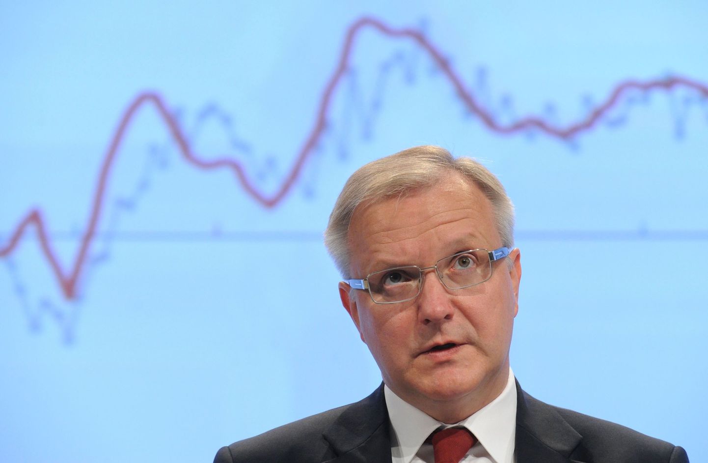 EU commissioner for Economic and Monetary Affairs Olli Rehn gives gestures during a press conference on the Autumn economic forecast at the EU headquarters in Brussels on december 29, 2010. The European Union admitted "concern" at the power of financial markets to sow "turbulence" undermining economic recovery and create further policy-making "tensions."
AFP PHOTO/JOHN THYS
