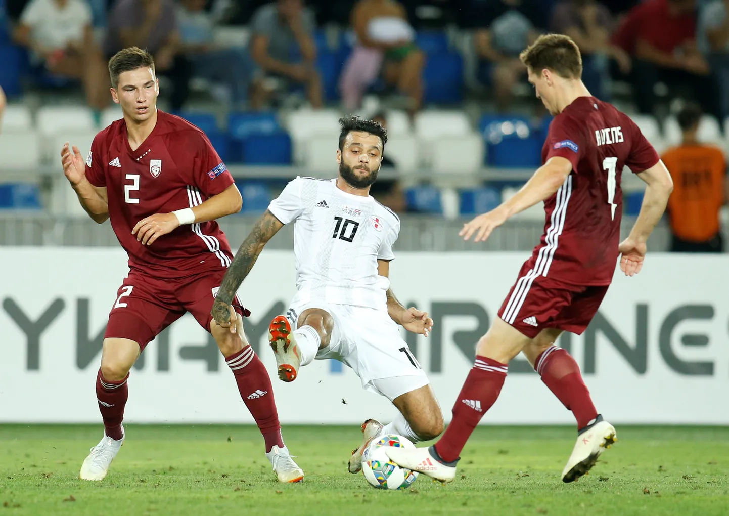 Soccer Football - UEFA Nations League - League D - Group 1 - Georgia v Latvia - Boris Paichadze Dinamo Arena, Tbilisi, Georgia - September 9, 2018  Georgia's Tornike Okriashvili in action with Latvia's Ritvars Rugins          REUTERS/David Mdzinarishvili