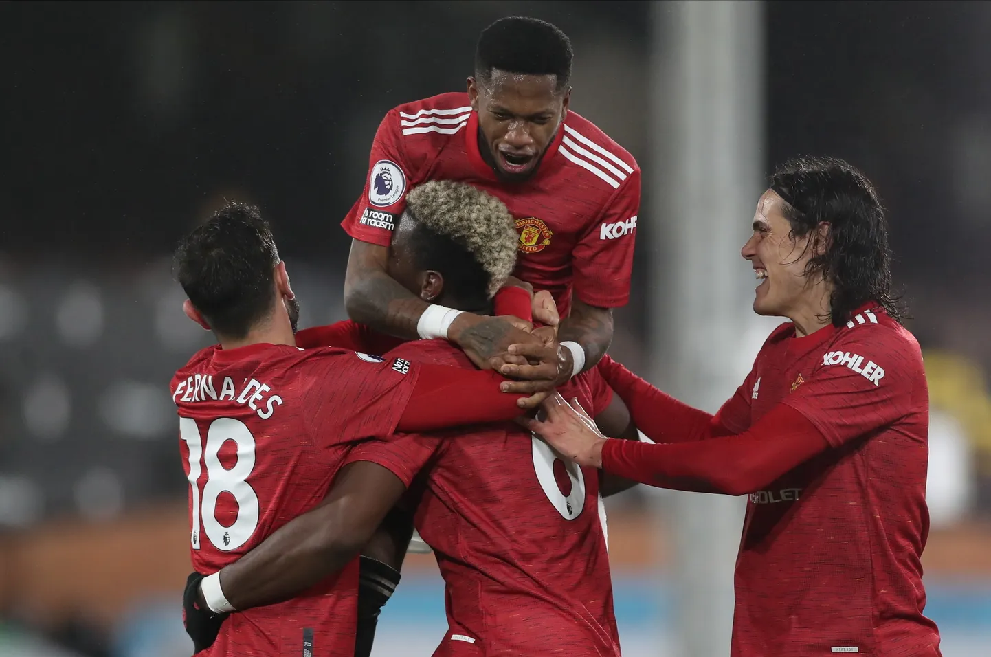 Manchester Unitedi mehed võiduväravat tähistamas.