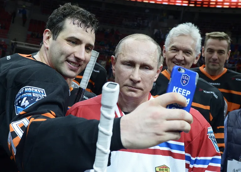 Roman Rotenberg, Vladimir Putin ja tagaplaanil Gennady Timtšenko.