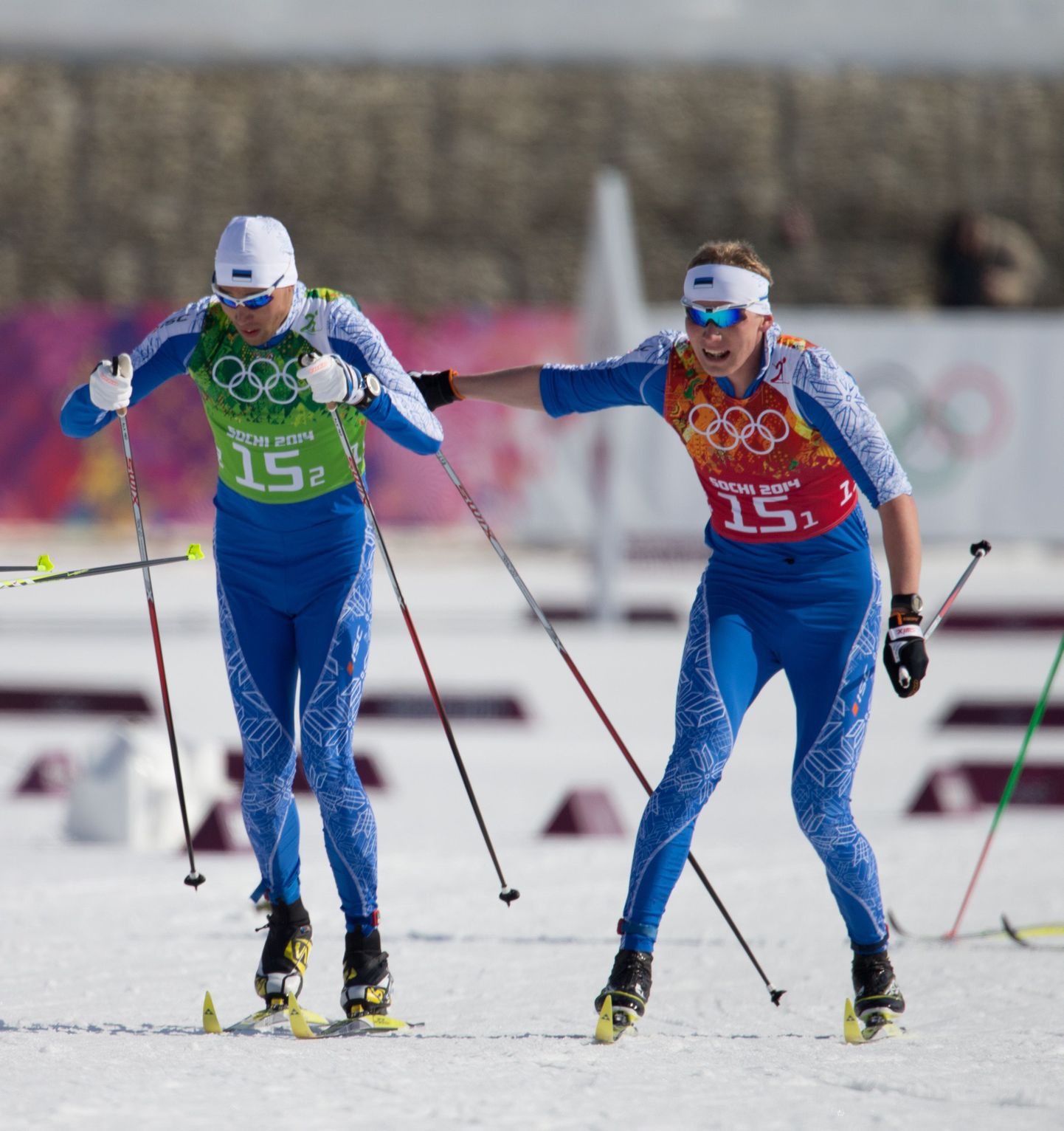 Algo Kärp (vasaku) ja Karel Tammjärv 2014. aastal Sotši taliolümpiamängude meeste murdmaasuusatamise 4x10 km teatesõidus.