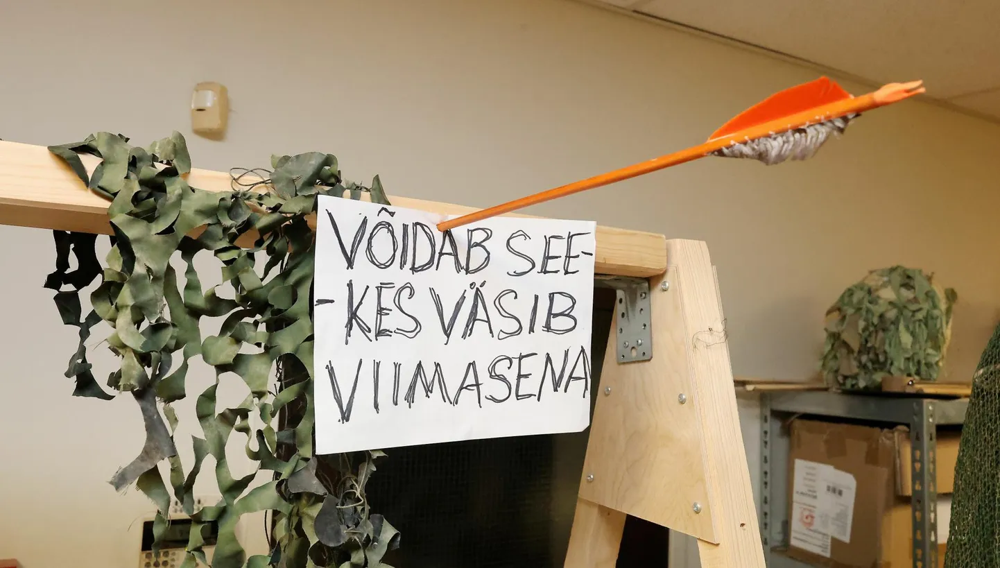 Tartu kaevikuküünalde valmistajate innustav silt.
