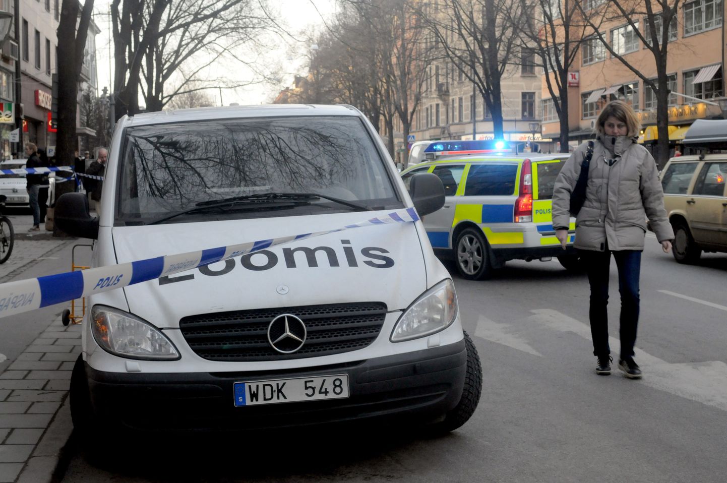 Politsei ja turvafirma Loomis autod Stockholmis.