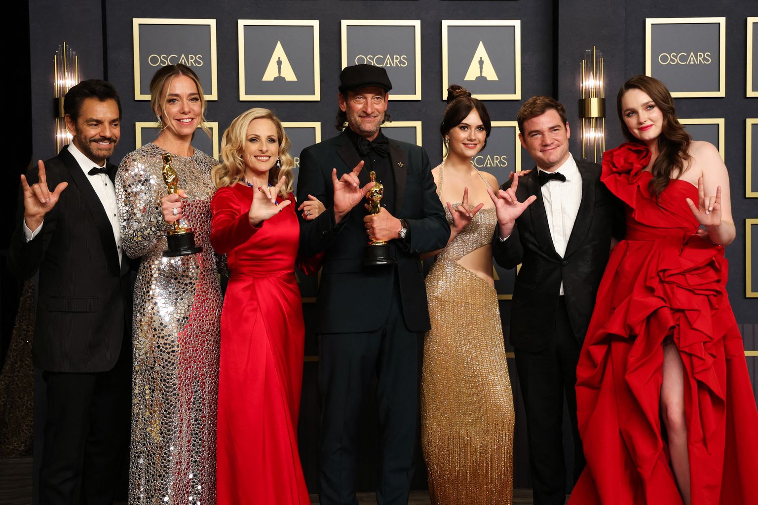 The cast and crew as well as presenter Amy Forsyth pose with their Oscars for Best Picture for "CODA" in the photo room during the 94th Academy Awards in Hollywood, Los Angeles, California, U.S., March 27, 2022.  REUTERS/Mario Anzuoni