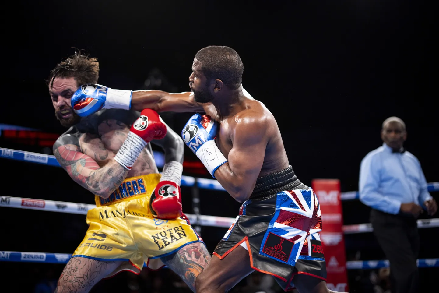 Aaron Chalmers ja Floyd Mayweather.