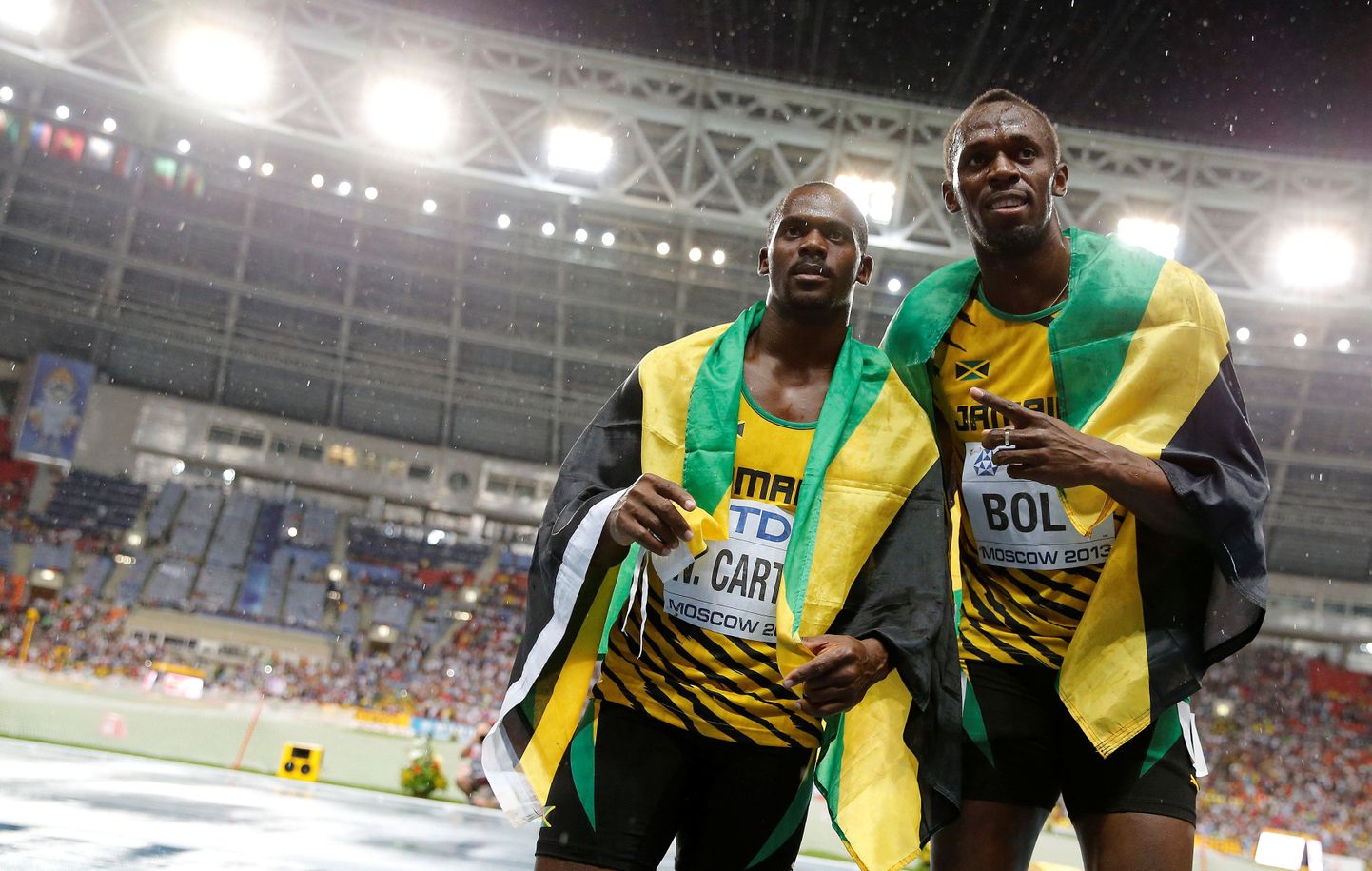 Usain Bolt (paremal) ja Nesta Carter