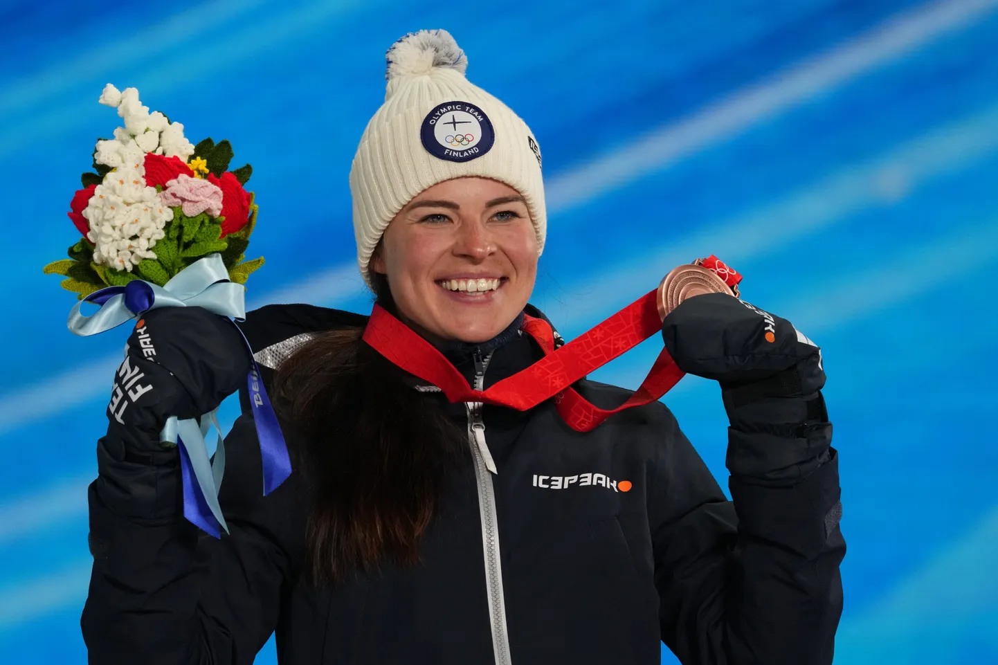 Krista Pärmäkoski 2022. aasta Pekingi olümpial võidetud pronksmedaliga.