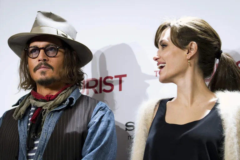 Johnny Depp ja Angelina Jolie (AP Photo/Victor R. Caivano)