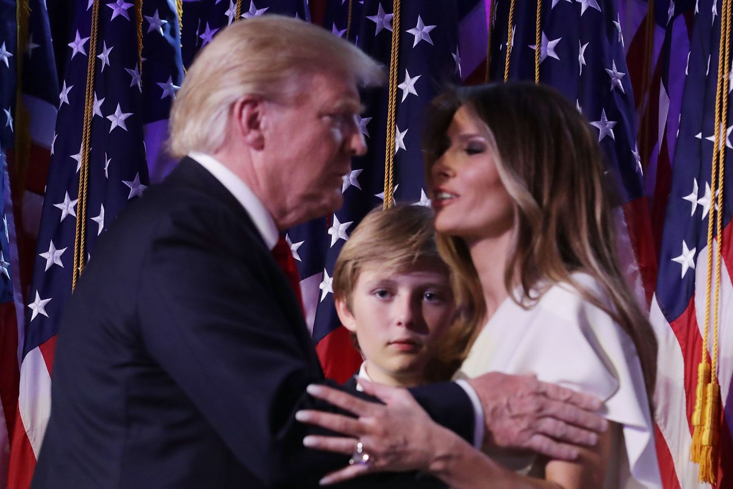 Дональд Трамп с женой и сыном.