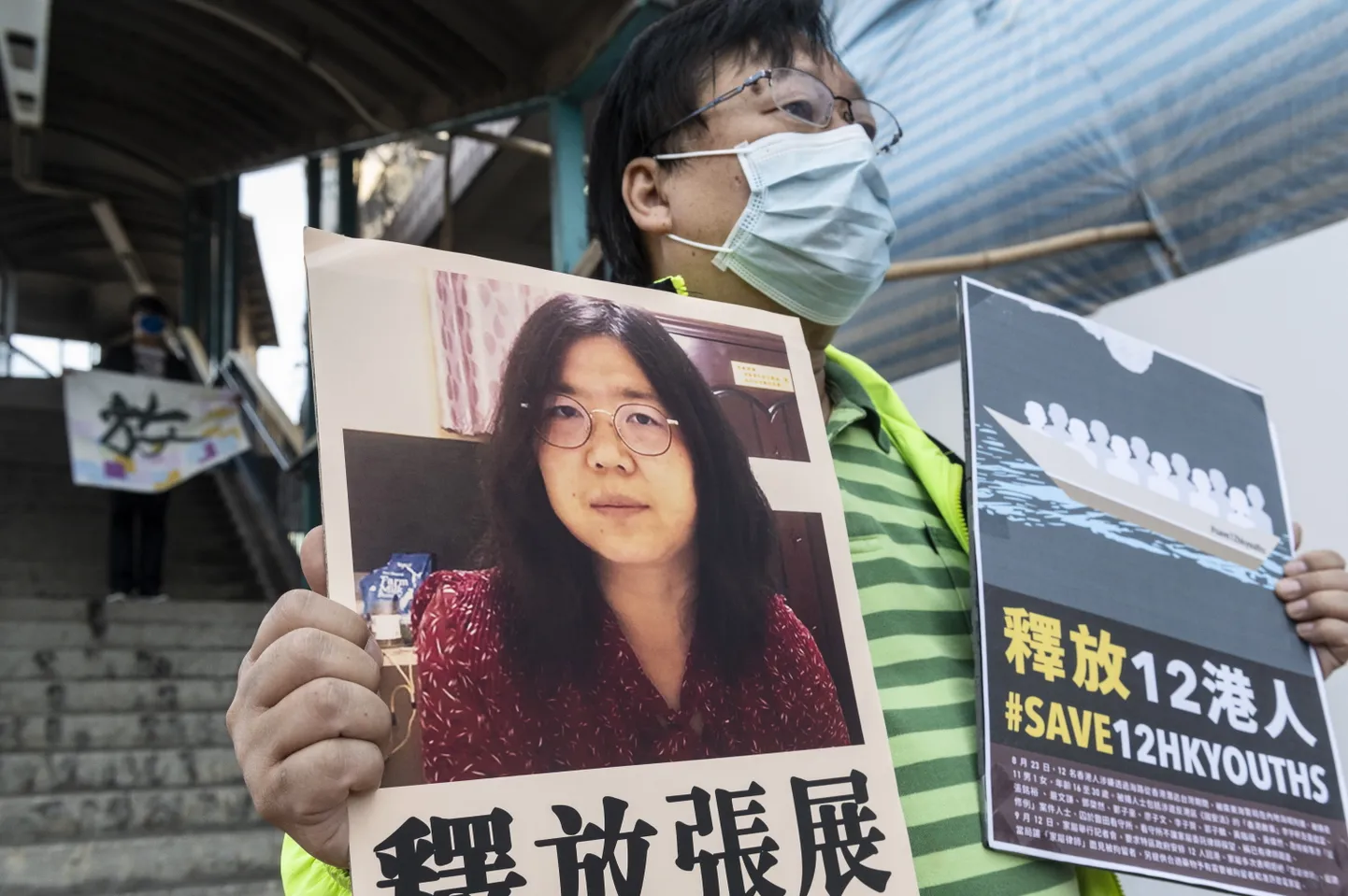 Protest vangistatud kodanikuajakirjaniku Zhang Zhani toetuseks Hongkongis.