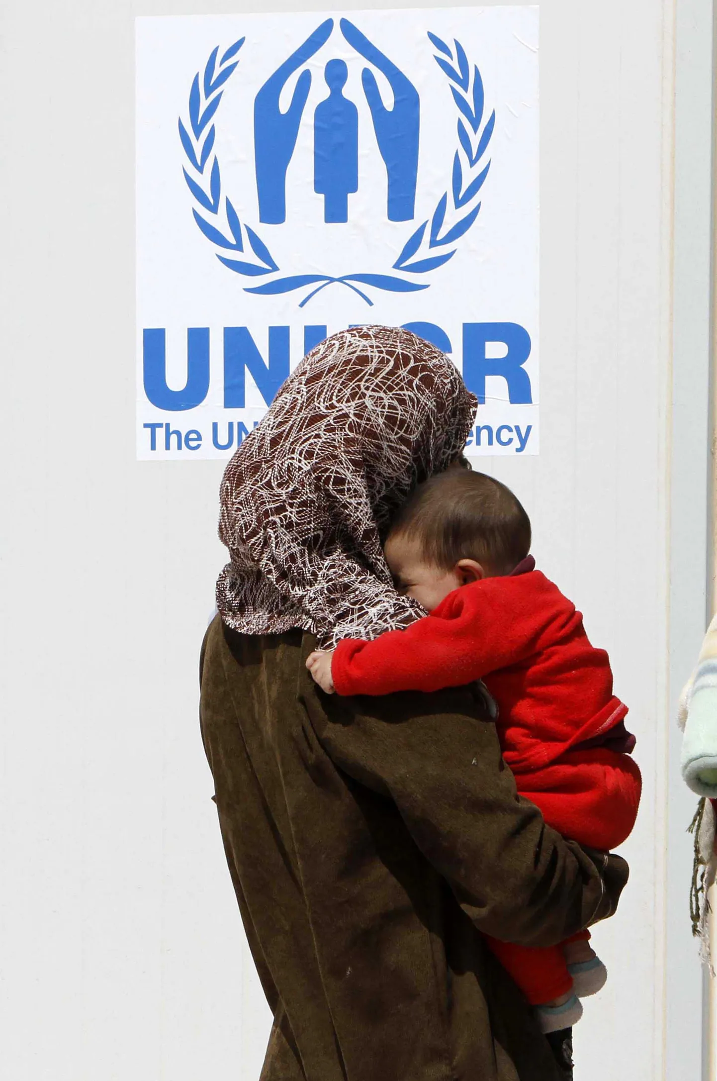 Süüria ema lapsega pagulaslaagris.